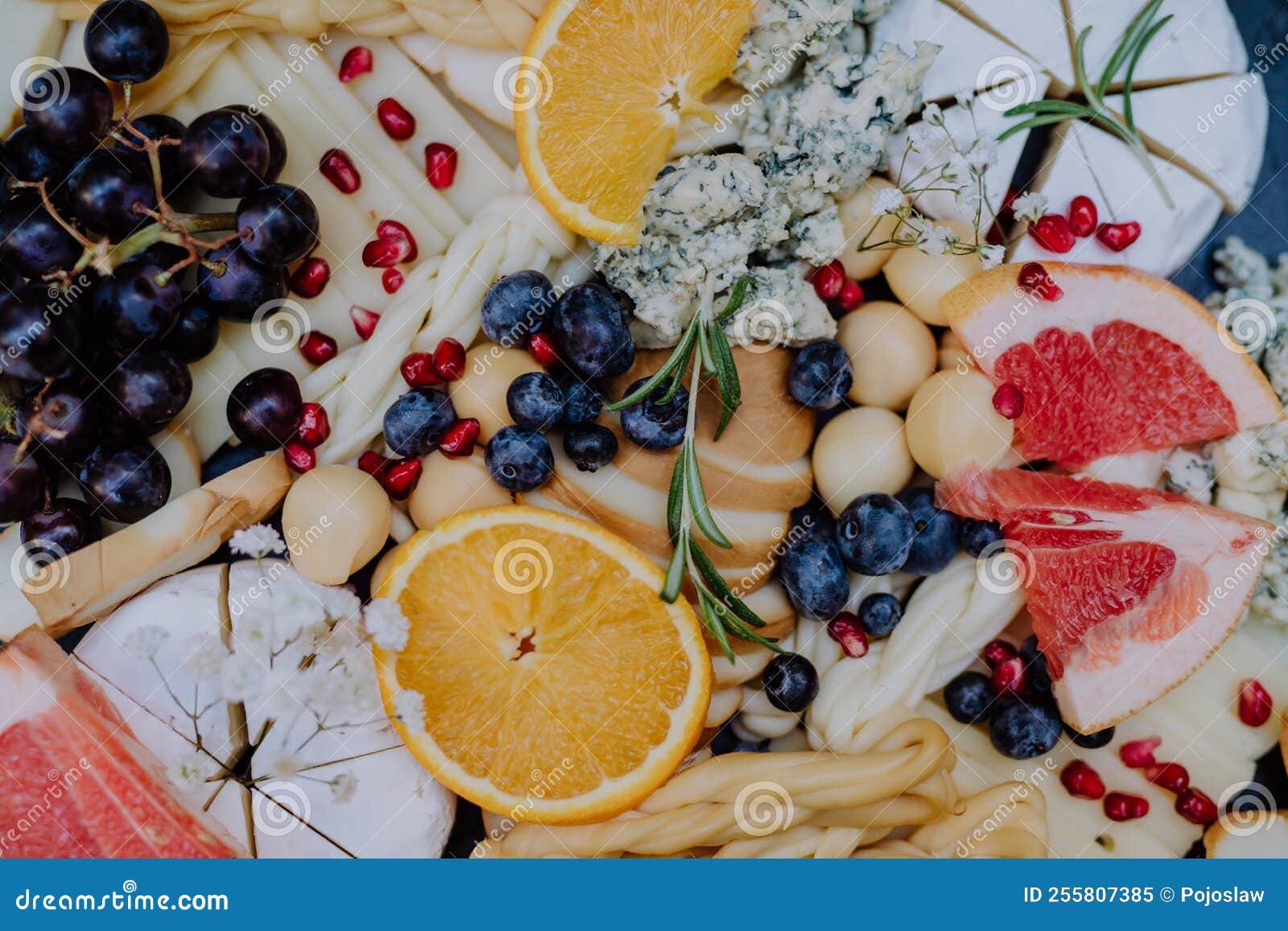 close-up of dessert buffet at small wedding reception outside in the backyard.