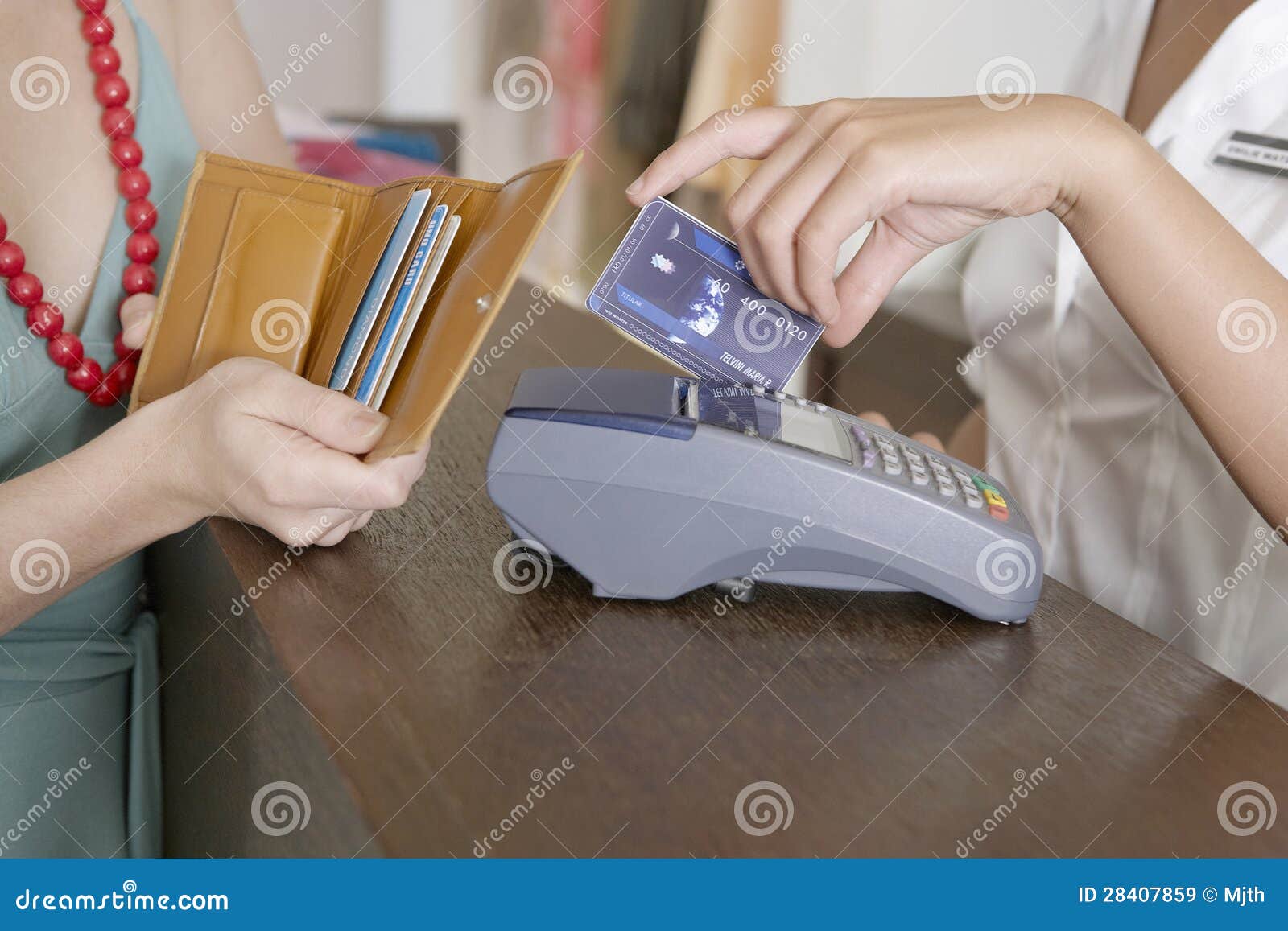 Close Up Detail of Client Making Payment by Counter Stock Image Image