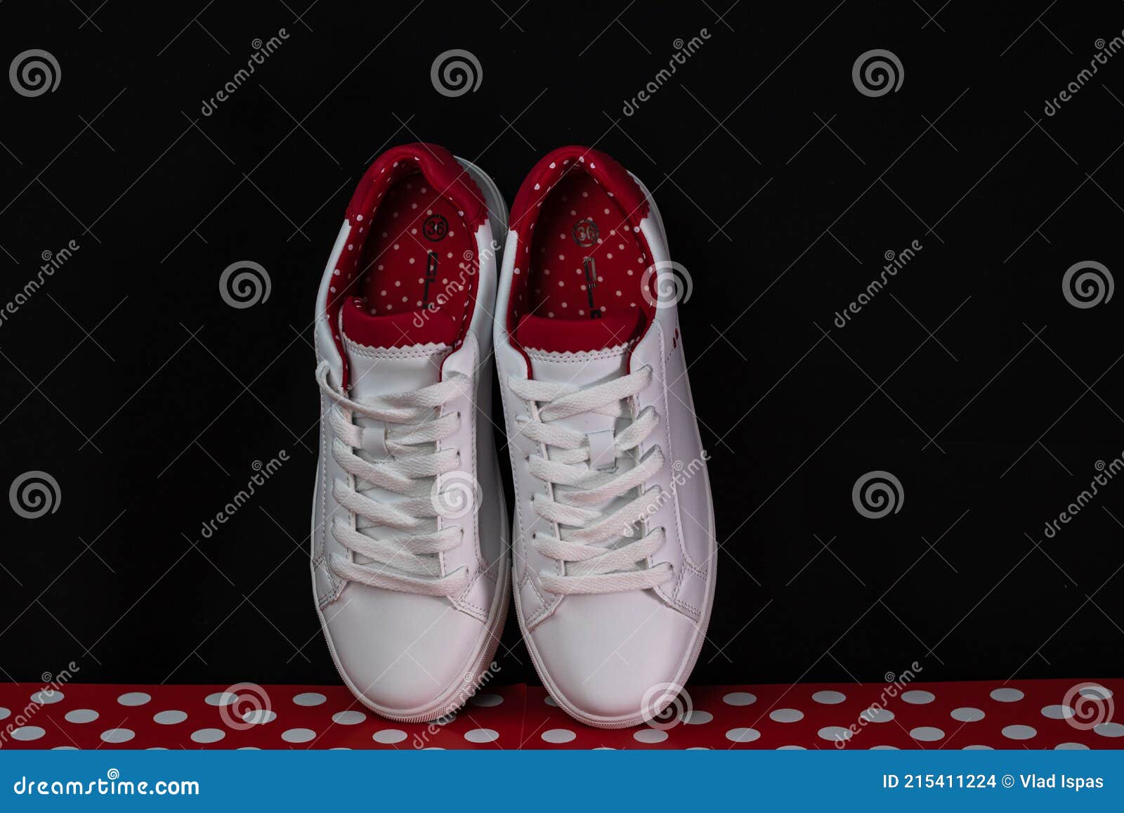 Partially relaxed Sidewalk Close Up on Details of Sport Shoes with White Dots in Bucharest, Romania,  2021 Stock Photo - Image of shoe, foot: 215411224
