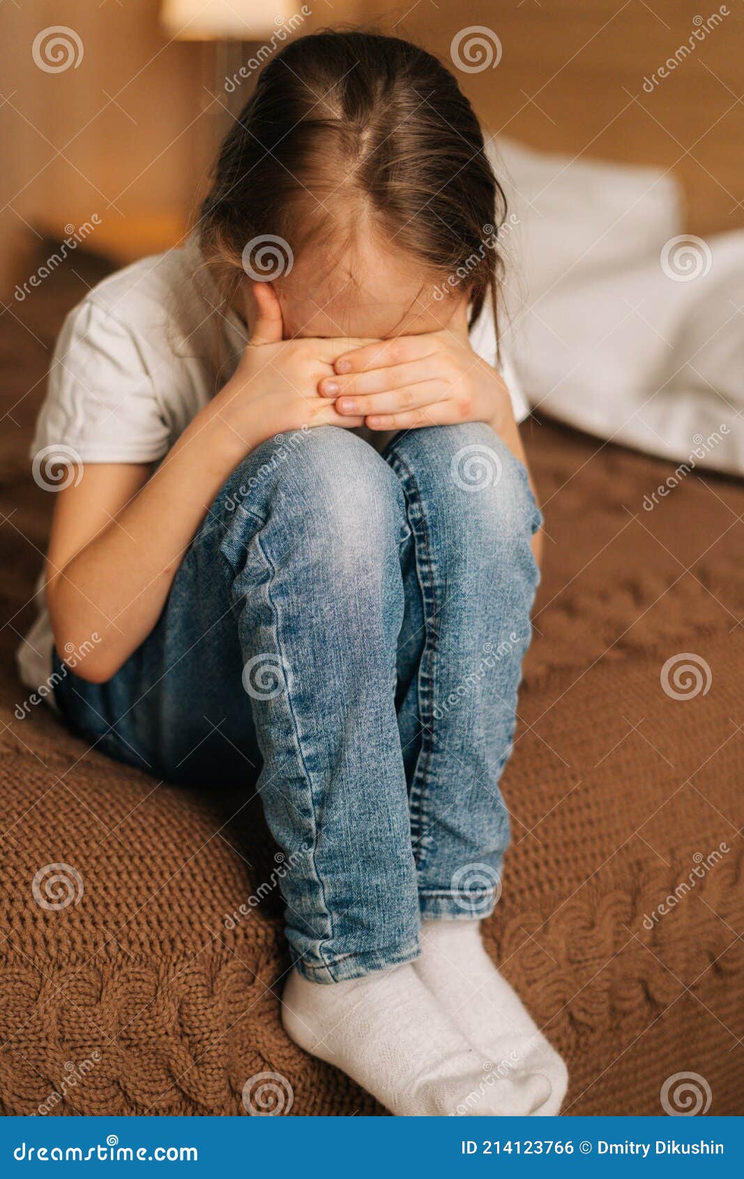 Close-up of Disappointed Little Girl Hugging Knee, Sobbing with ...