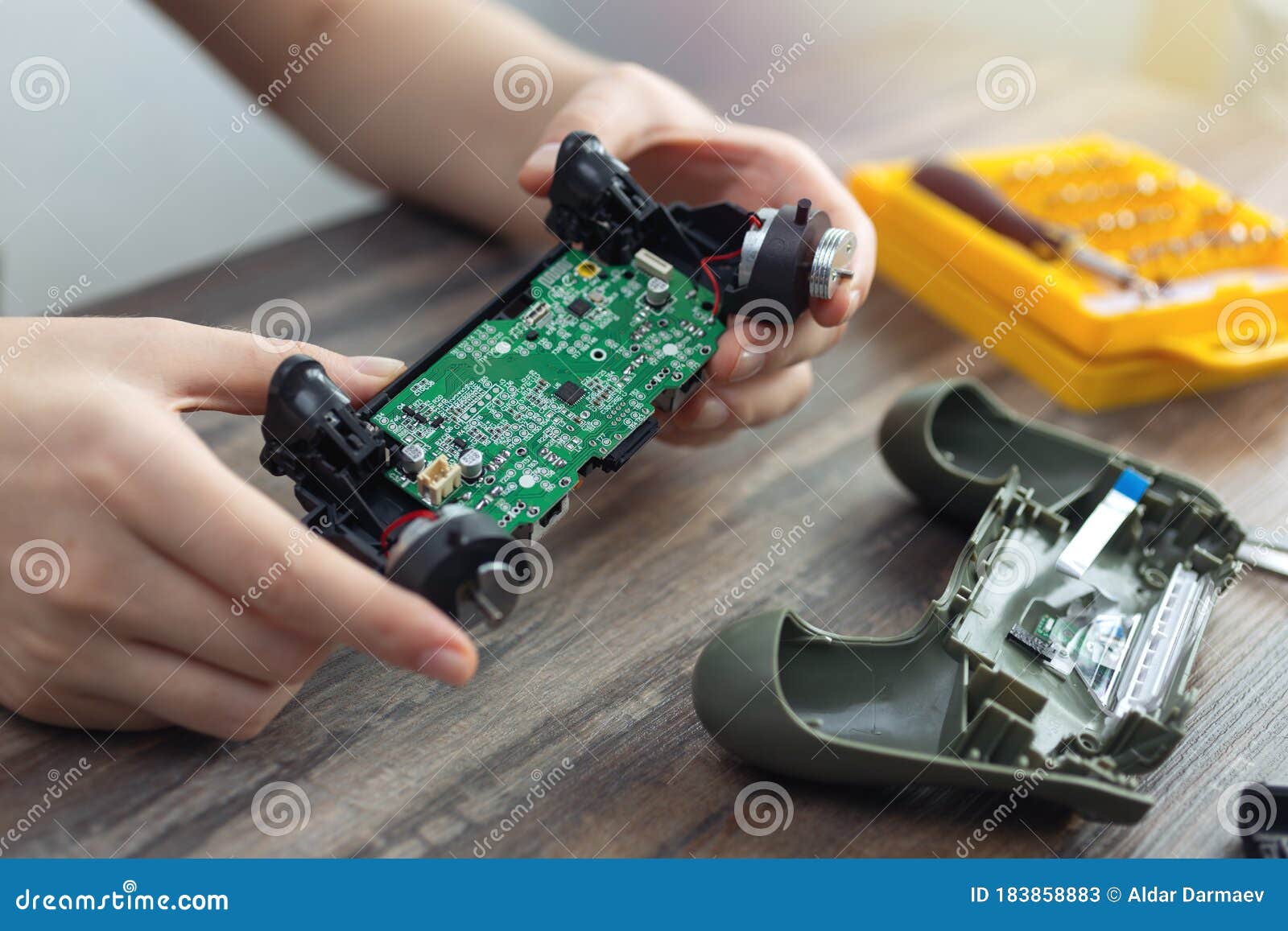 close up of disassemble game controller repairing, cleaning or diagnostic.