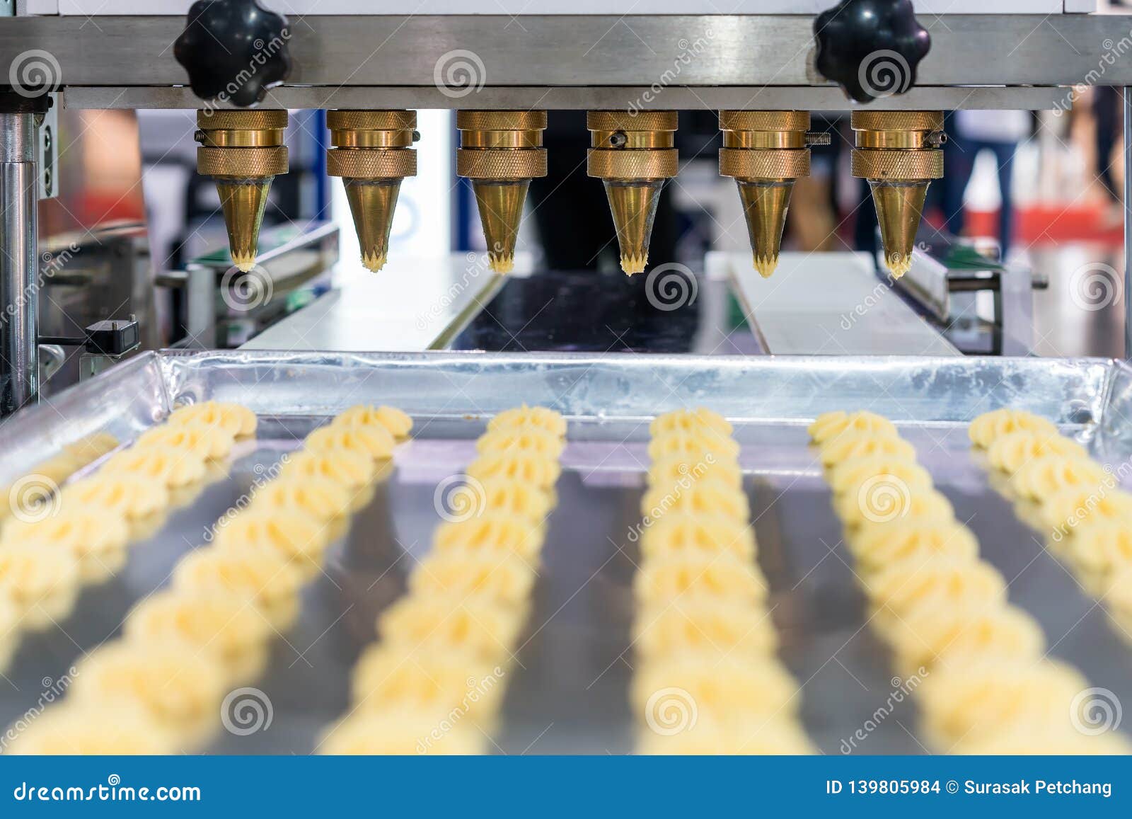 Close Up Dough or Cream and Nozzle Discharge of Automatic Biscuit or