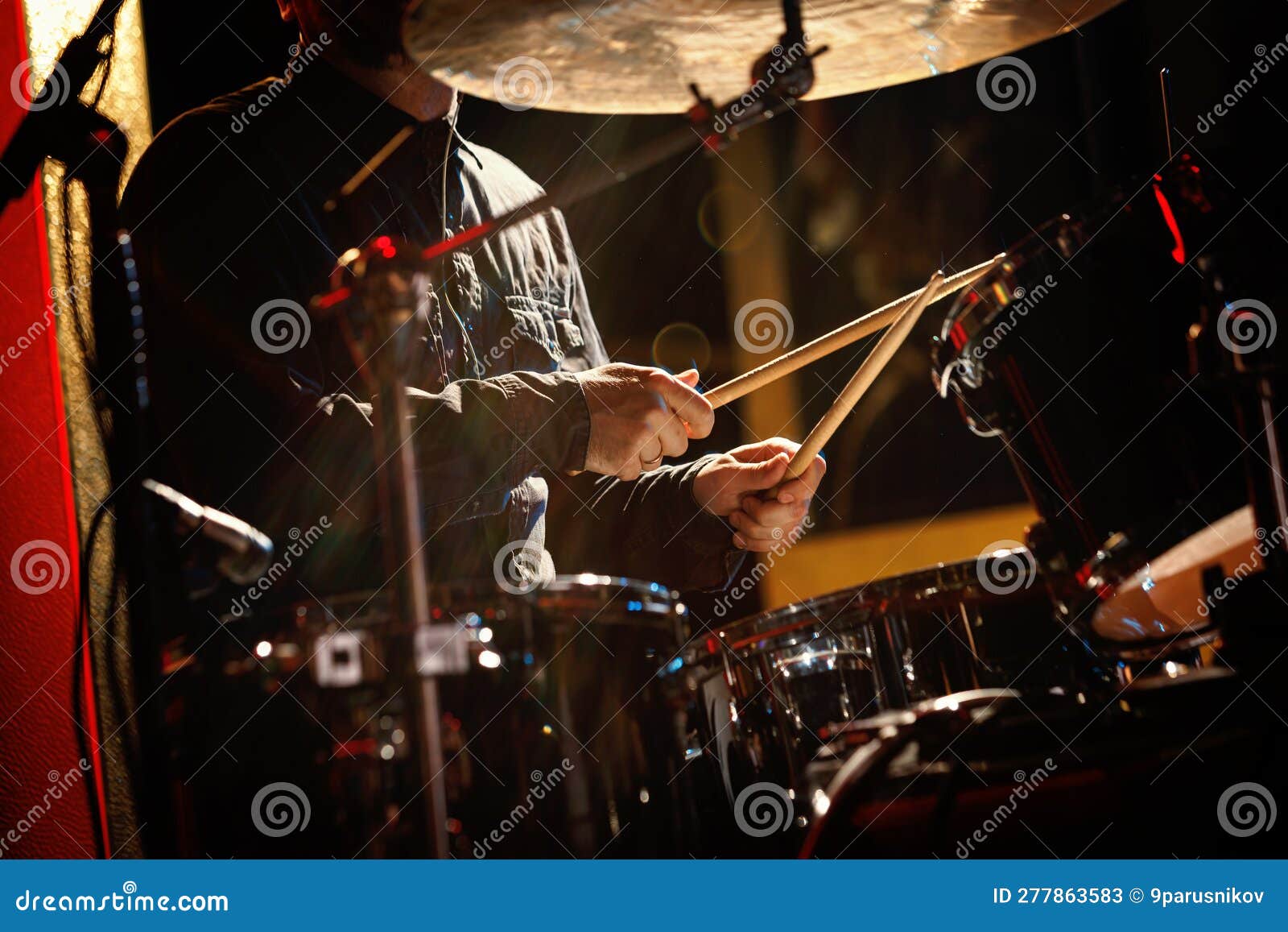 Closeup of Drummer Drumsticks with a Drum Set. Stock Image Image of
