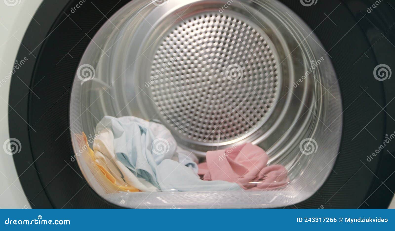 Close Up of Drying Machine. Drying Laundry Clothes. Dryer Laundry