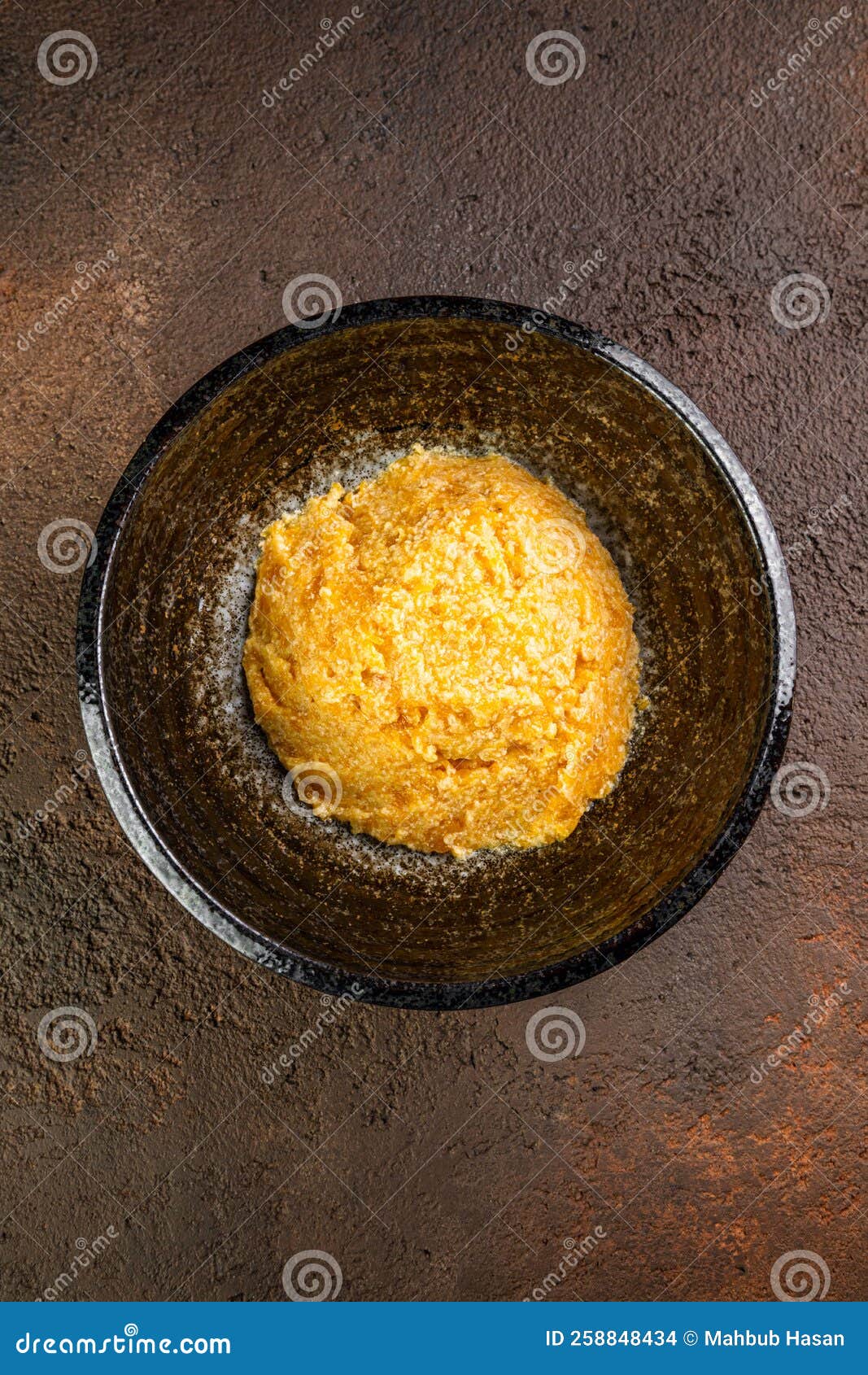 Closeup of Egg Benedict with Ham, Eggs Florentine Close Up on a Black