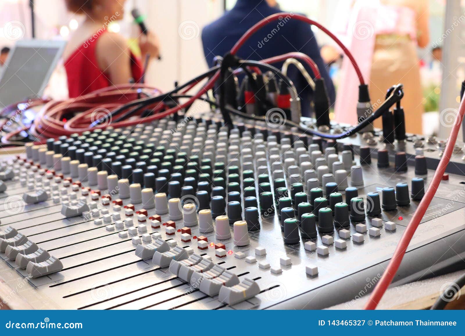 Closeup of Electronic Devices DJ Tuner Control the Microphone in the