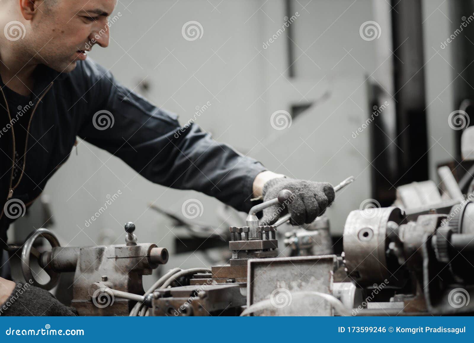 Close Up Engineering Industrial Worker is Working on Metal Work Factory Process Stock Photo