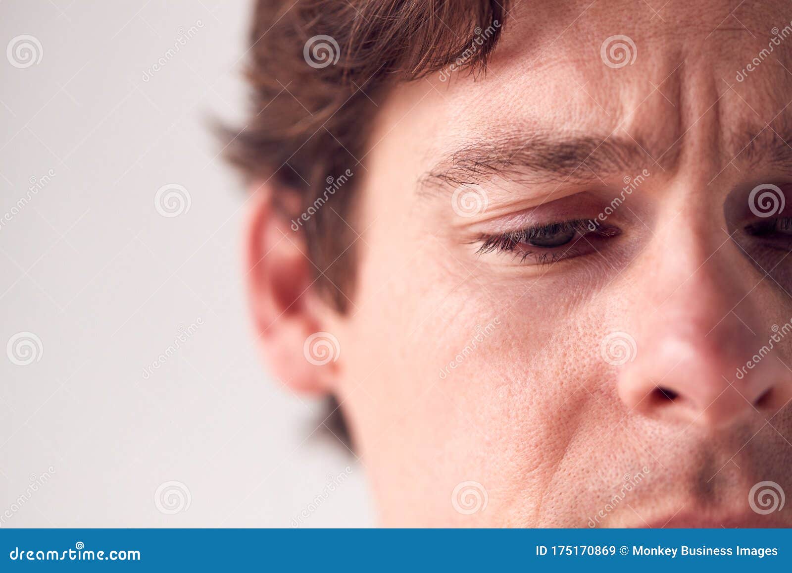 Close Up on Face of Unhappy Man Shot in Studio Stock Image - Image of ...