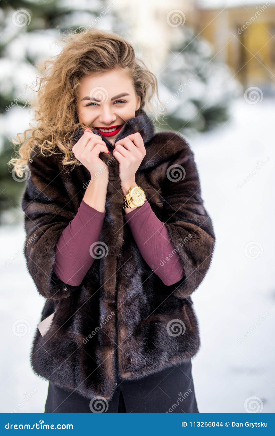 close up fashion portrait of attractive woman in coat. charming lady with new casual outfit. happy young woman in city street.