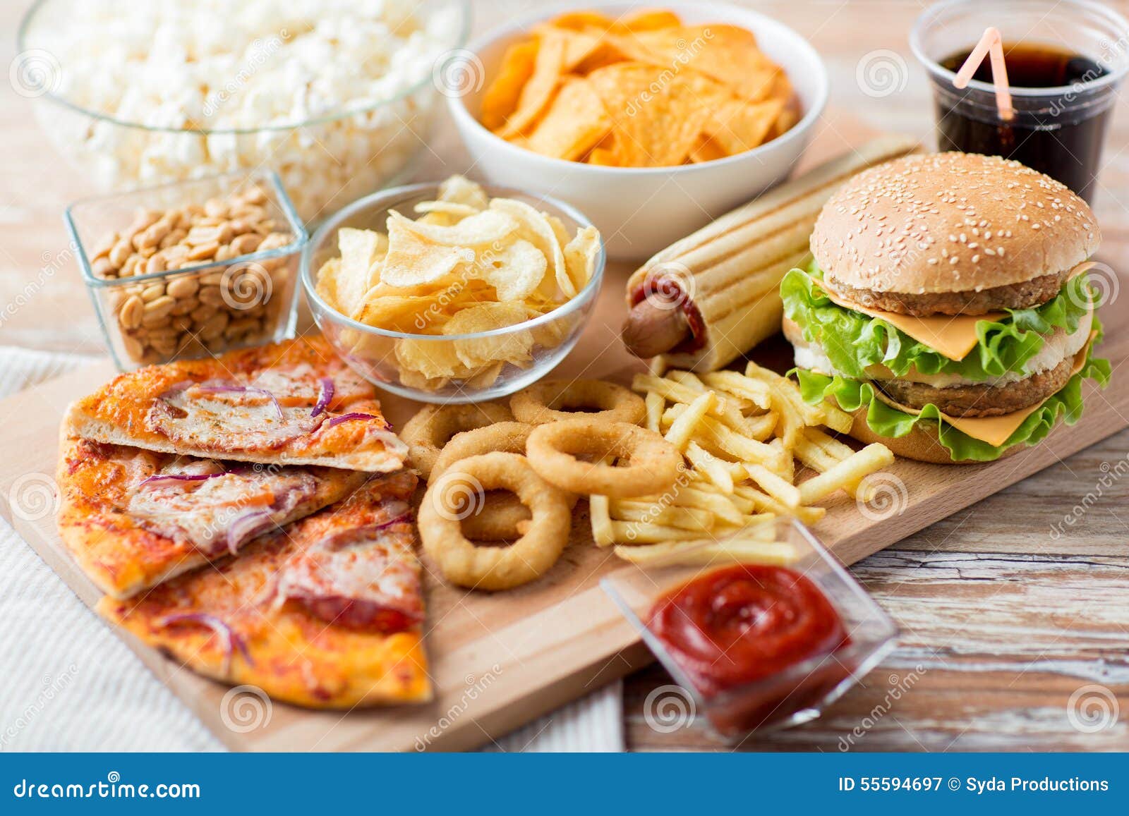 Close Up Of Fast Food Snacks  And Drink On Table Stock 