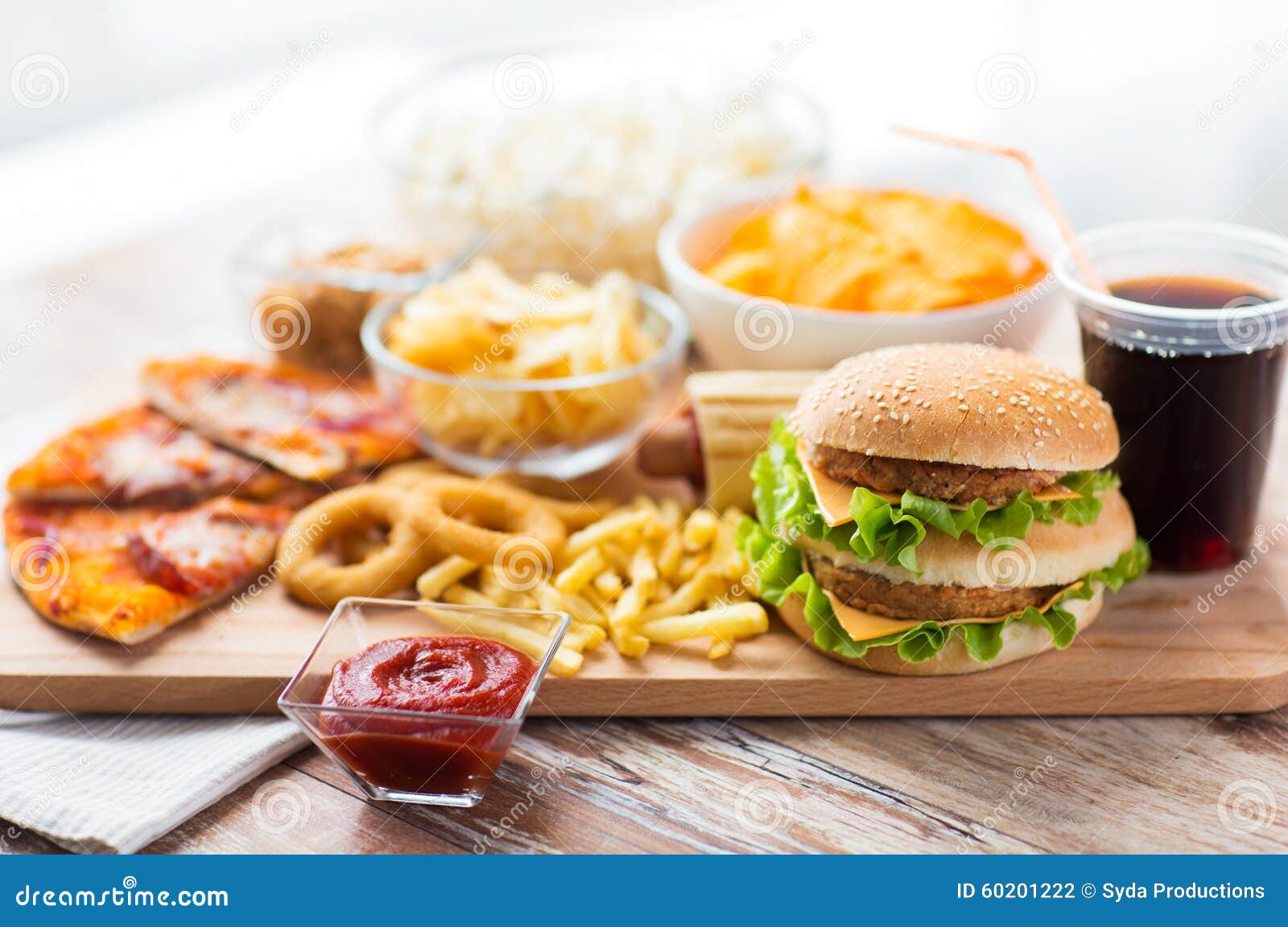 Close Up Of Fast Food Snacks  And Drink On Table Stock 