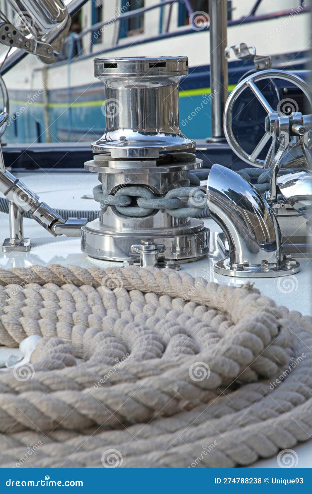 Closeup of Fittings and a Rope on the Deck of a Boat Stock Photo