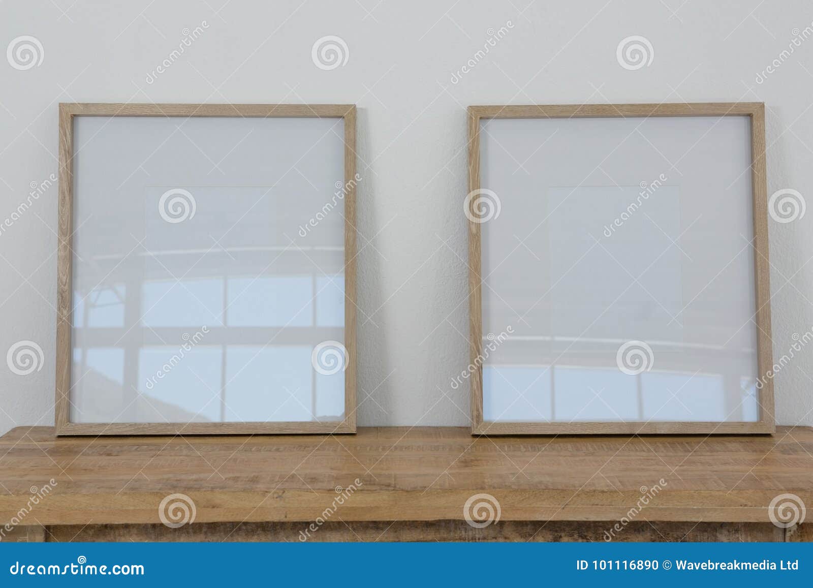 Frames Arranged on Wooden Table Stock Photo Image of order, frame 101116890