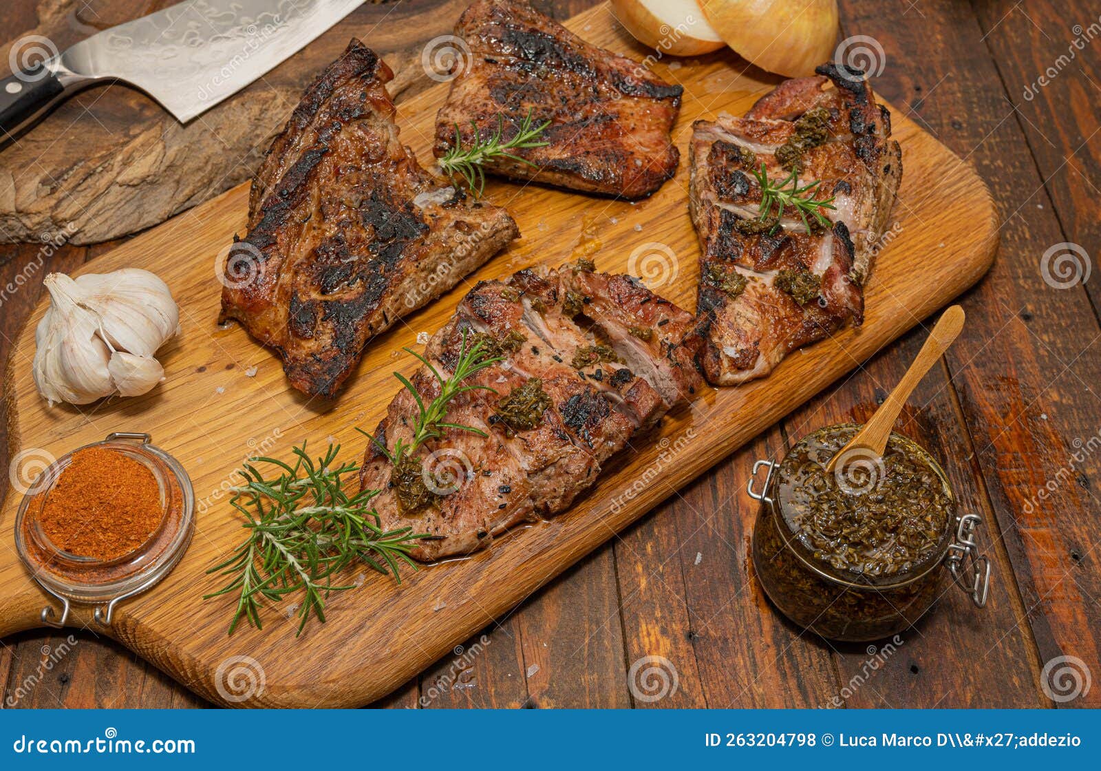 close up of freshly cooked pork secreto iberico with chimichurri