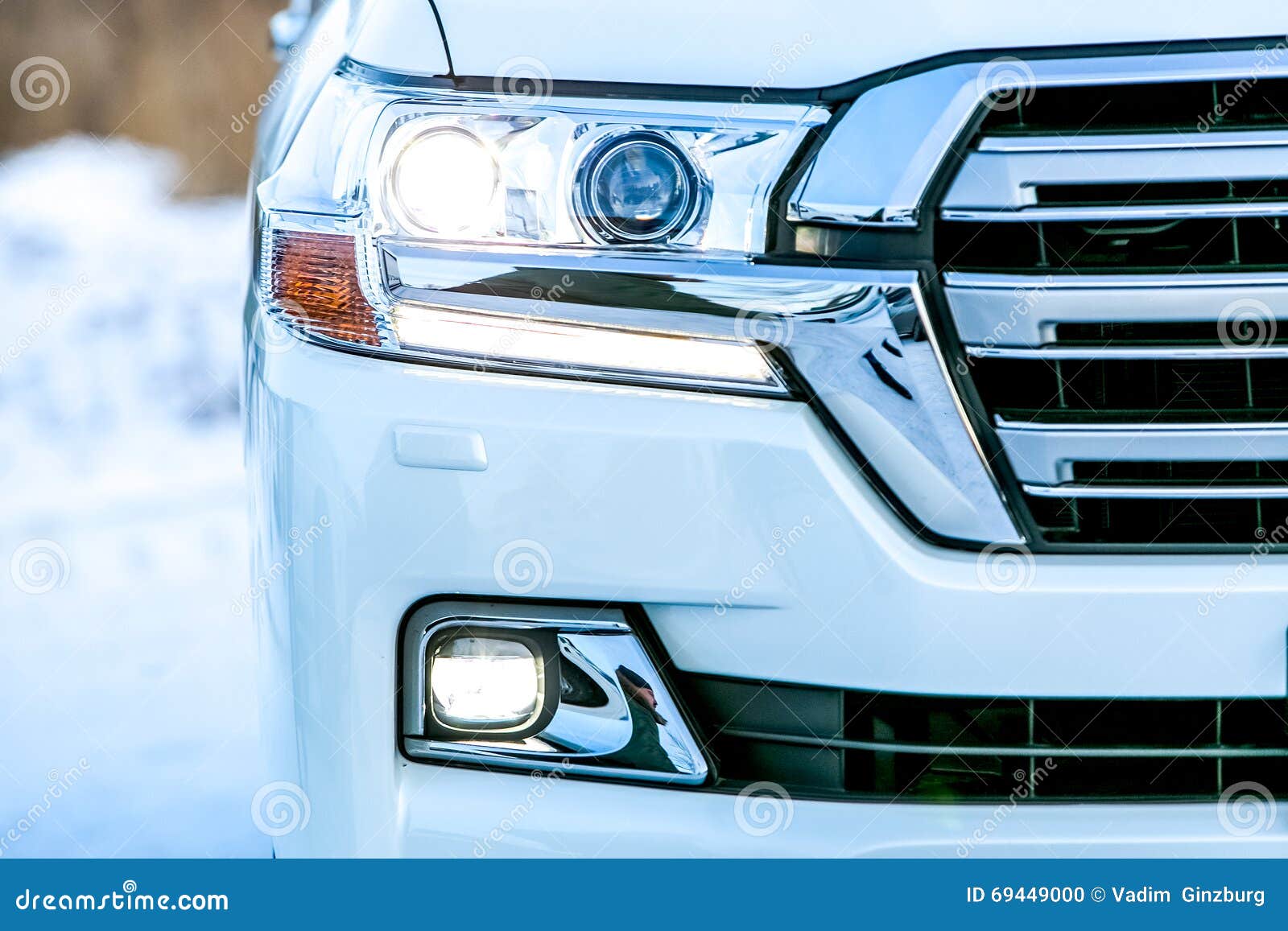 close up front of new silver car bumper