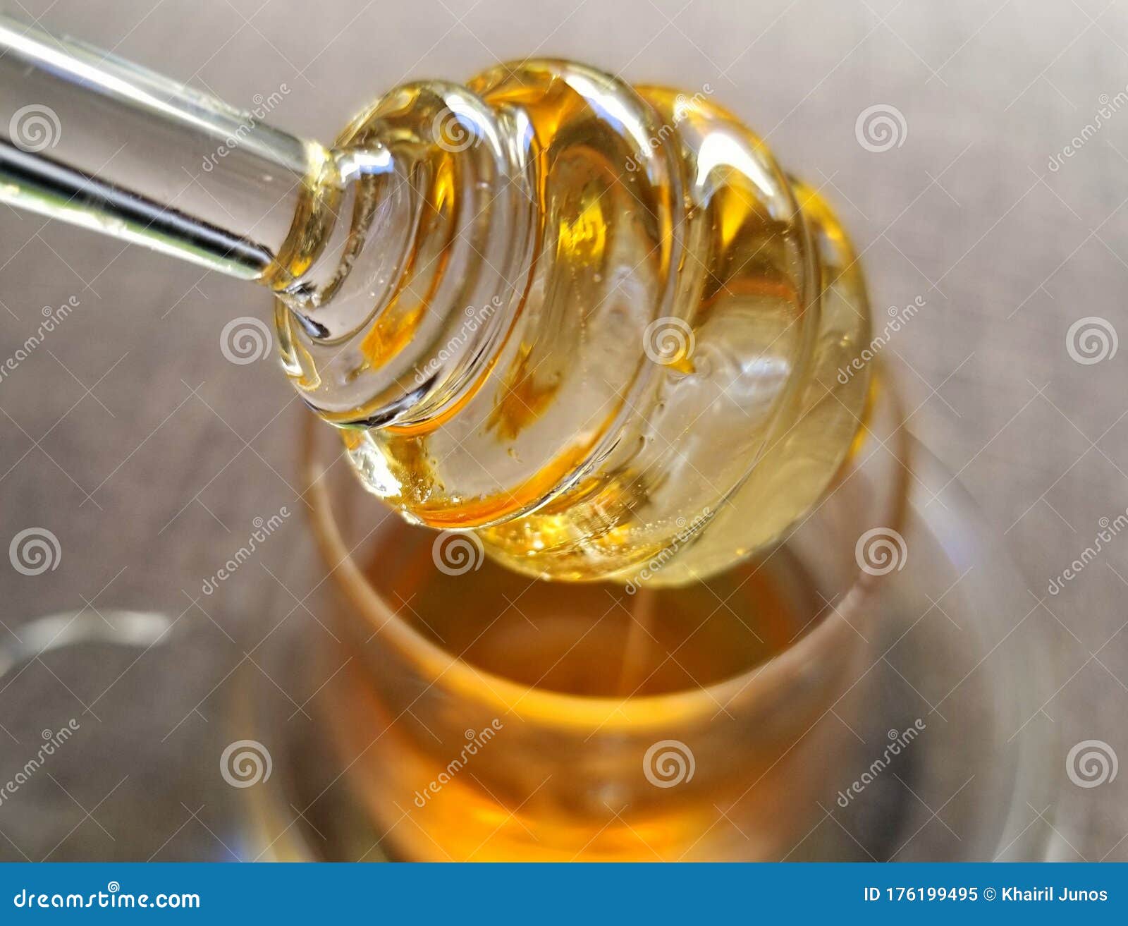 A Close Up of the Glass Honey Dipper Stock Image Image of dipper