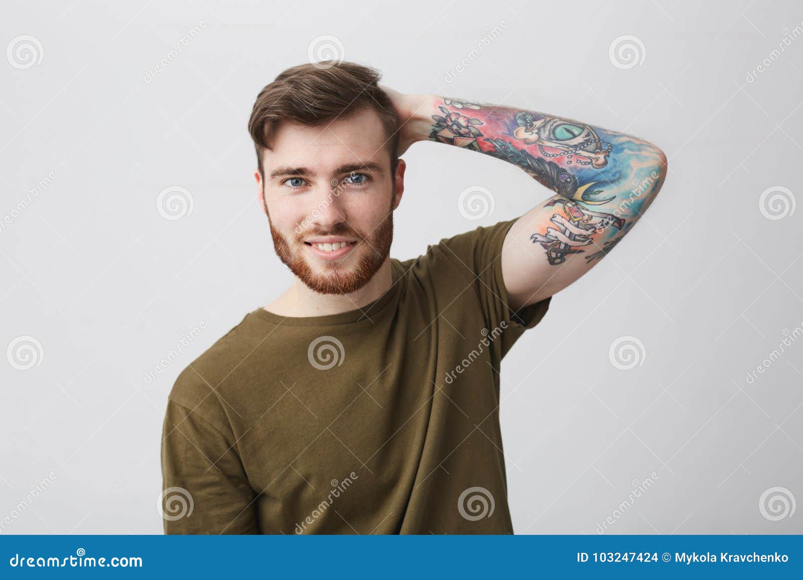 Close Up of Good-looking Cool European Guy with Beard and Arm Tattoo Smiling Brightfully, Holding Hand Behind Head with Stock Photo - Image of athletic, cool: 103247424