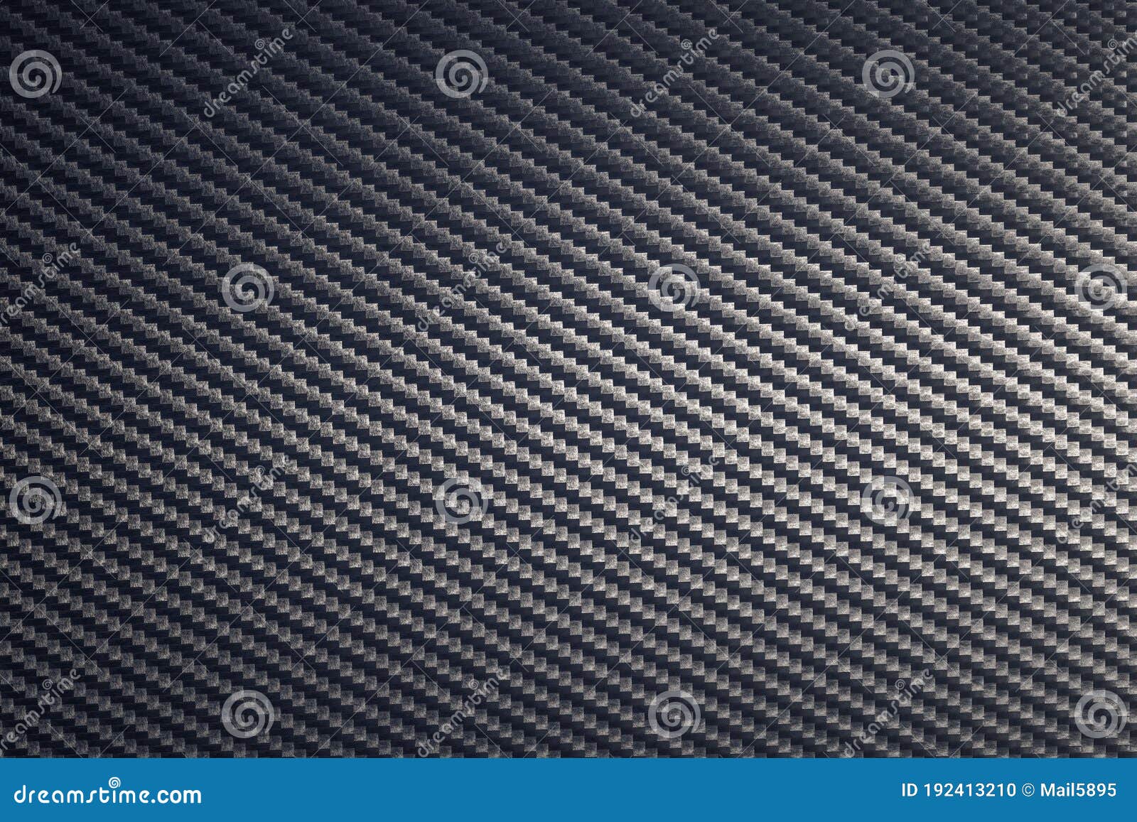 Close Up of Grey Diagonal Oriented Woven Carbon Fibre Sheet Surface