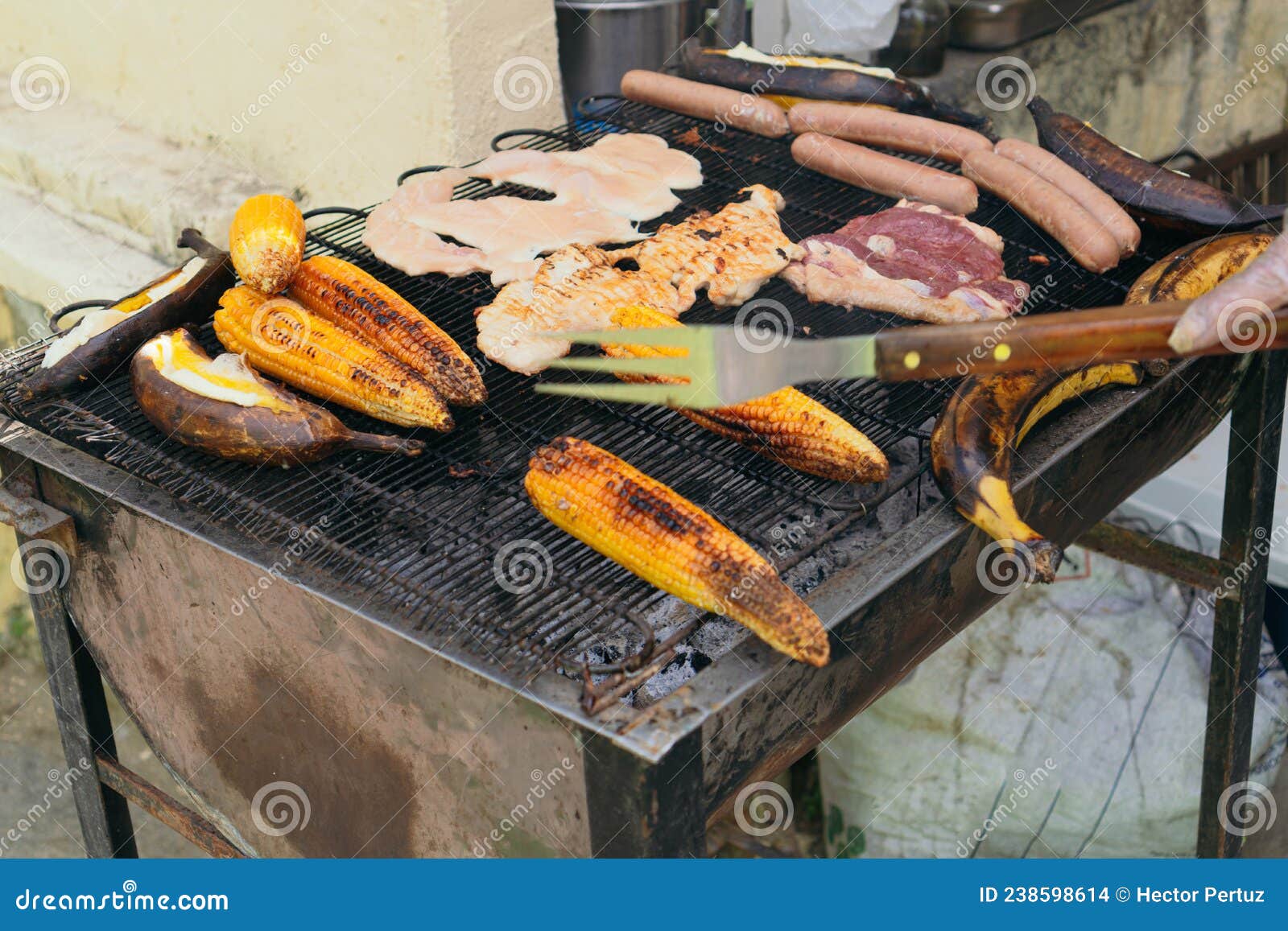 A Closeup of a Grill with Different Foods on a Barbecue Stock Photo