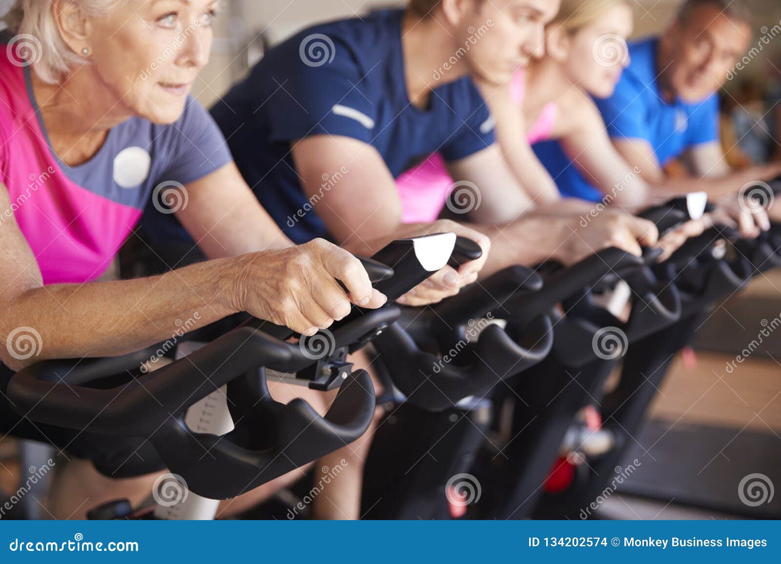 Close Up of Group Taking Spin Class in Gym Stock Photo Image of