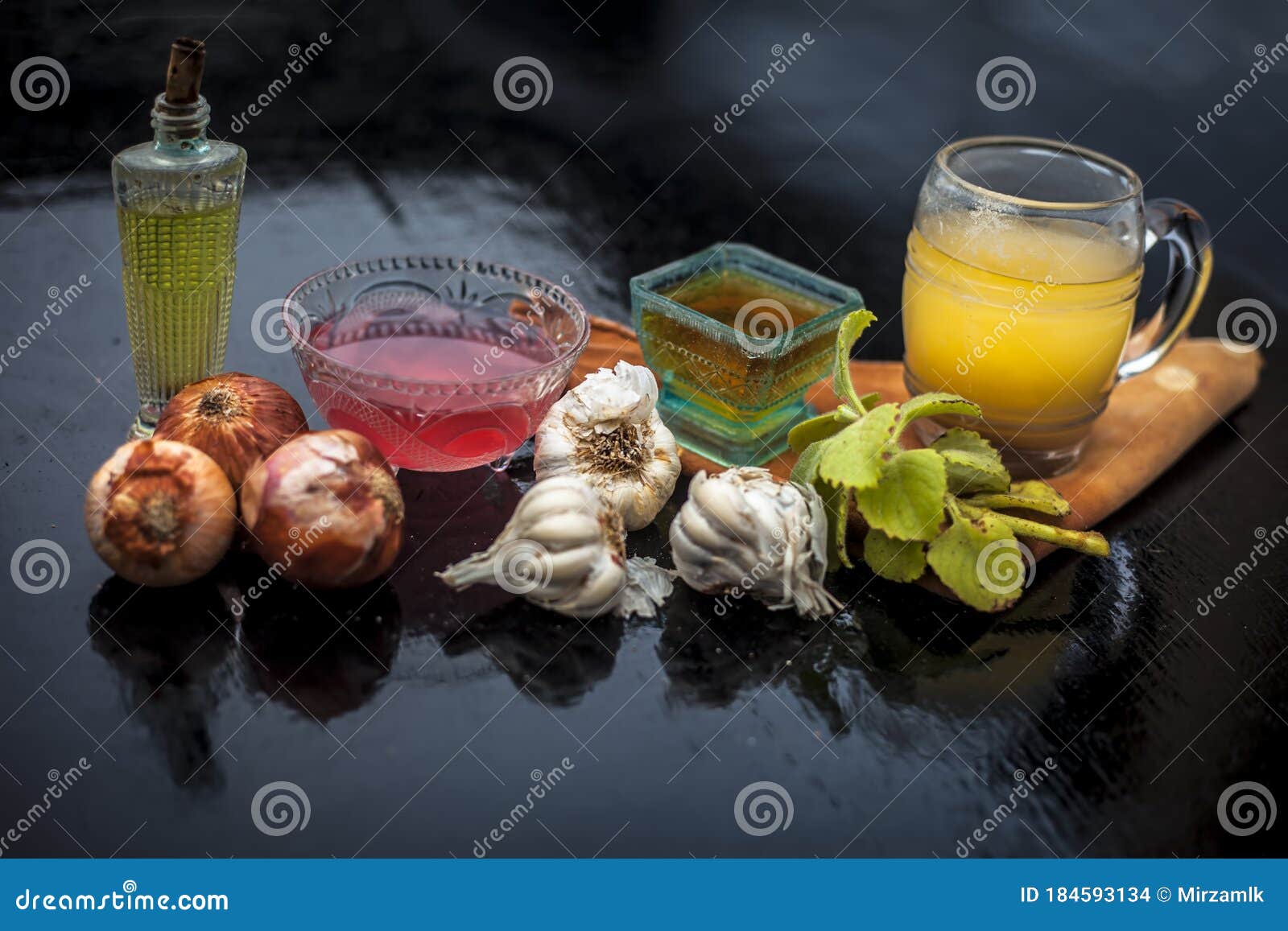 Close Up of Hair Treatment or Remedy To Increase Hair Growth Instantly  Consisting of Onion Juice, Garlic Juice and Olive Oil in a Stock Photo -  Image of health, beauty: 184593134