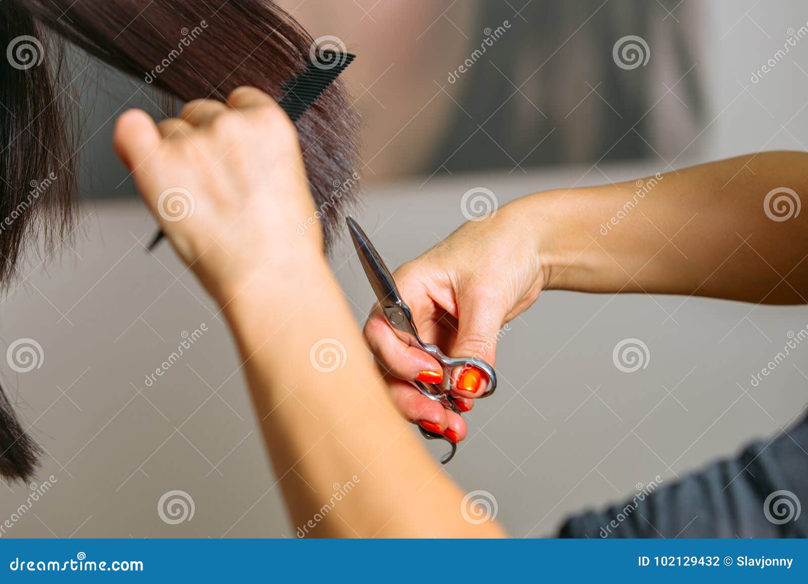 Close Up Of Hairdressers Hands Shearing Long Black Hair With