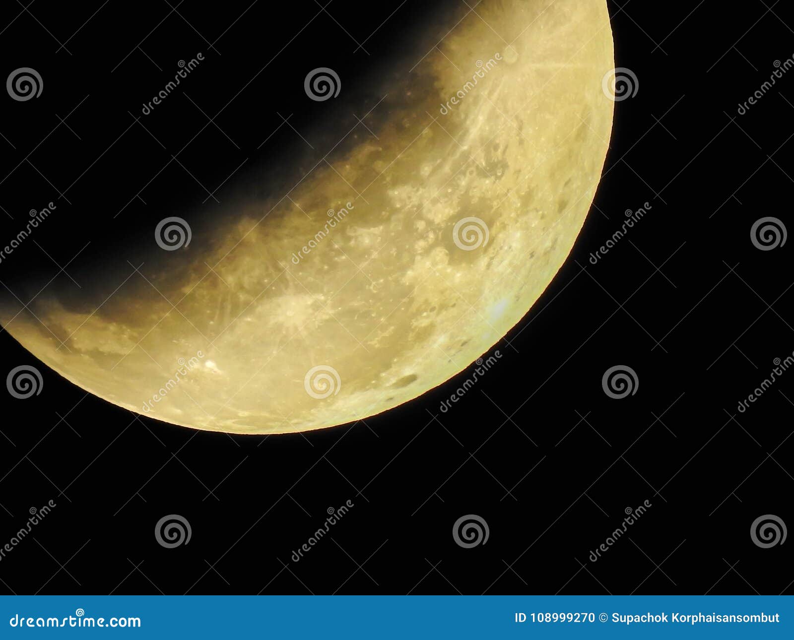 Close Up Half Blue Moon during Lunar Eclipse and a Supermoon All Stock