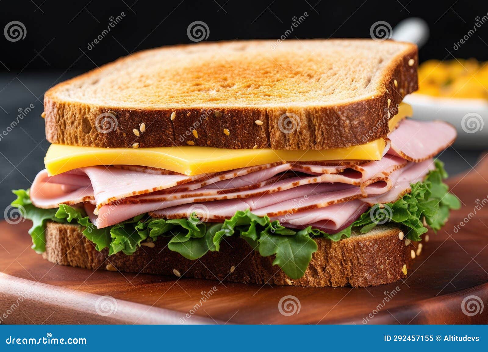 Closeup of a Ham and Cheese Sandwich on Whole Wheat Bread Stock Image