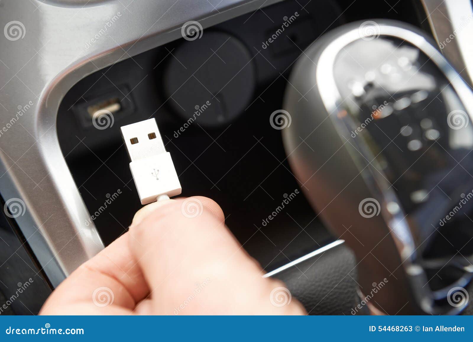 Close Up of Hand Holding USB Connector in Car Stock Image Image of