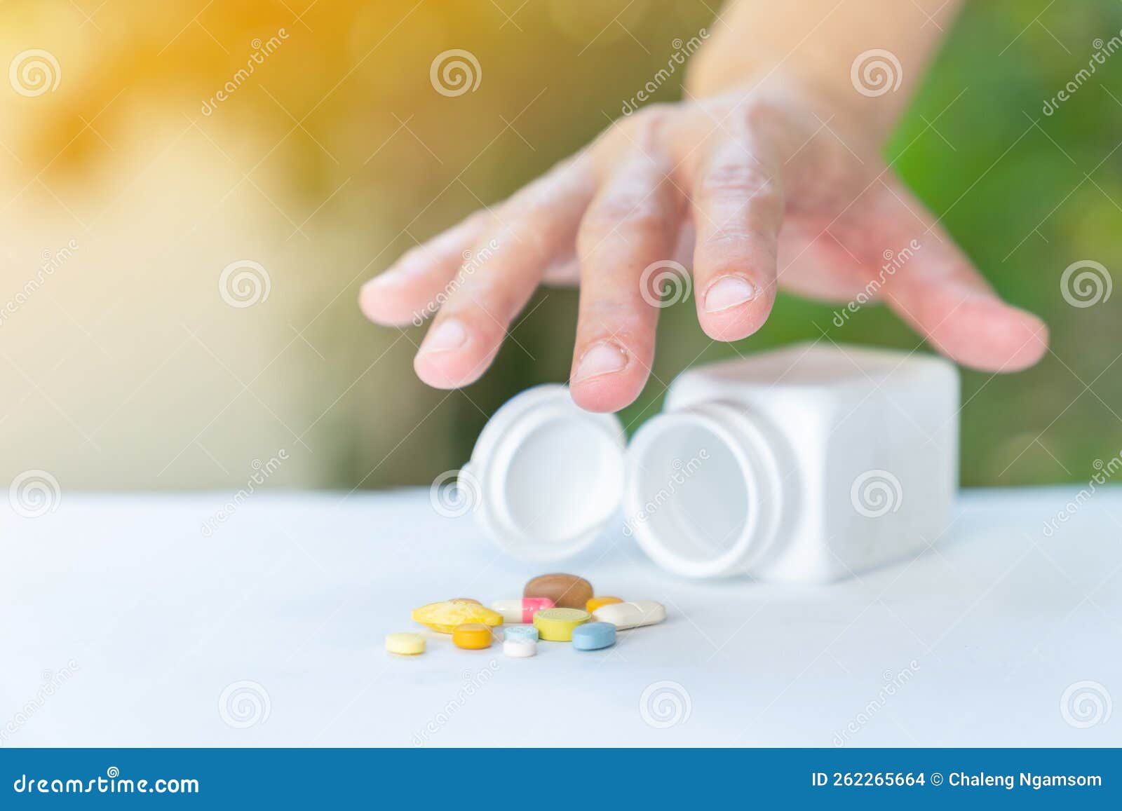 close up hand pick up drug