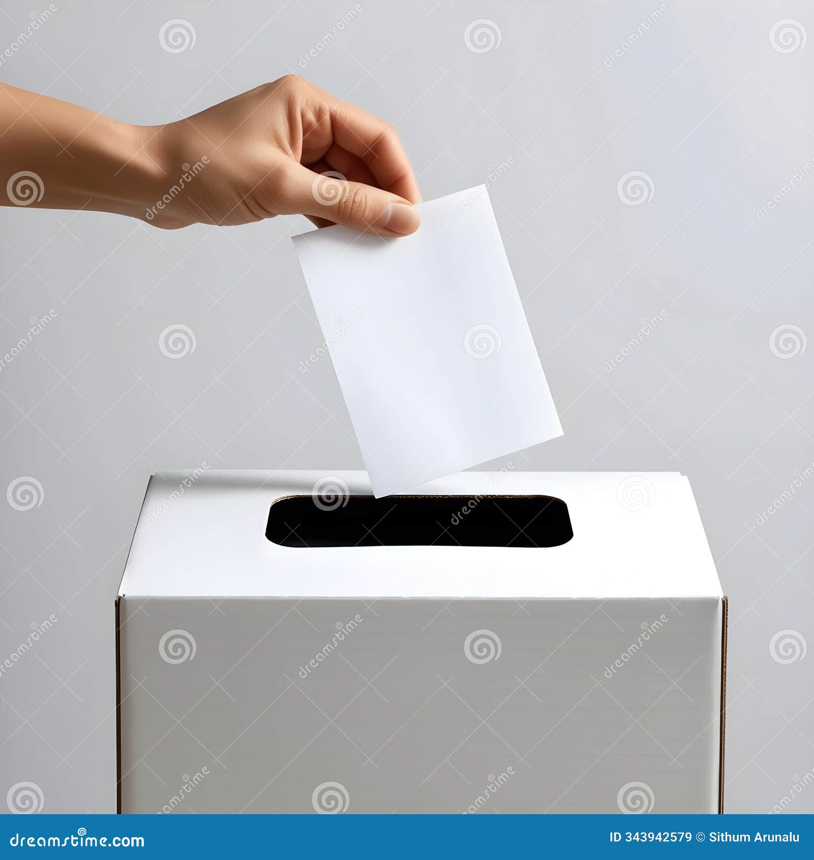 hand casting vote into ballot box