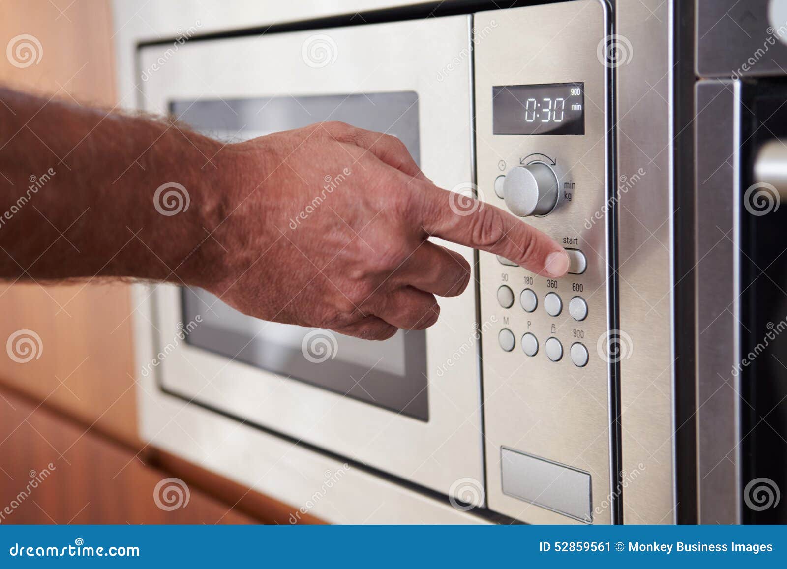 Analog Timer And Heat Setting For Microwave Oven White Color, Hand  Adjustment For Kitchen Food And Bakery Cooking Stock Photo, Picture and  Royalty Free Image. Image 135518983.