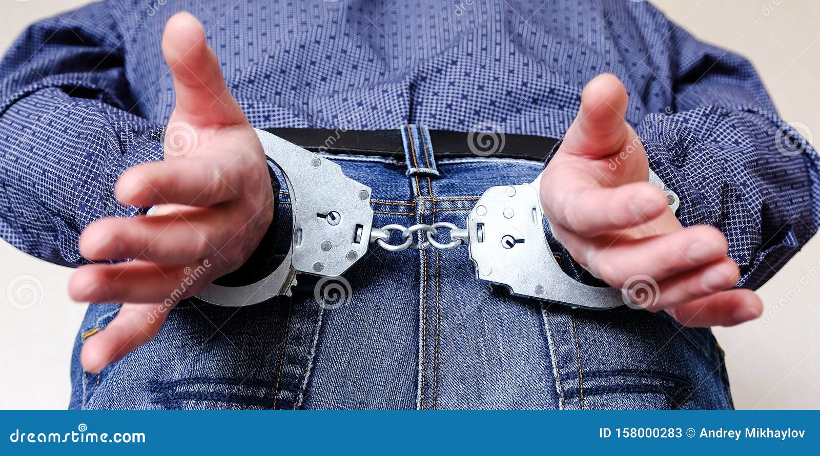 Closeup Of Handcuffed Hands. The Value Of The Security. Insulation