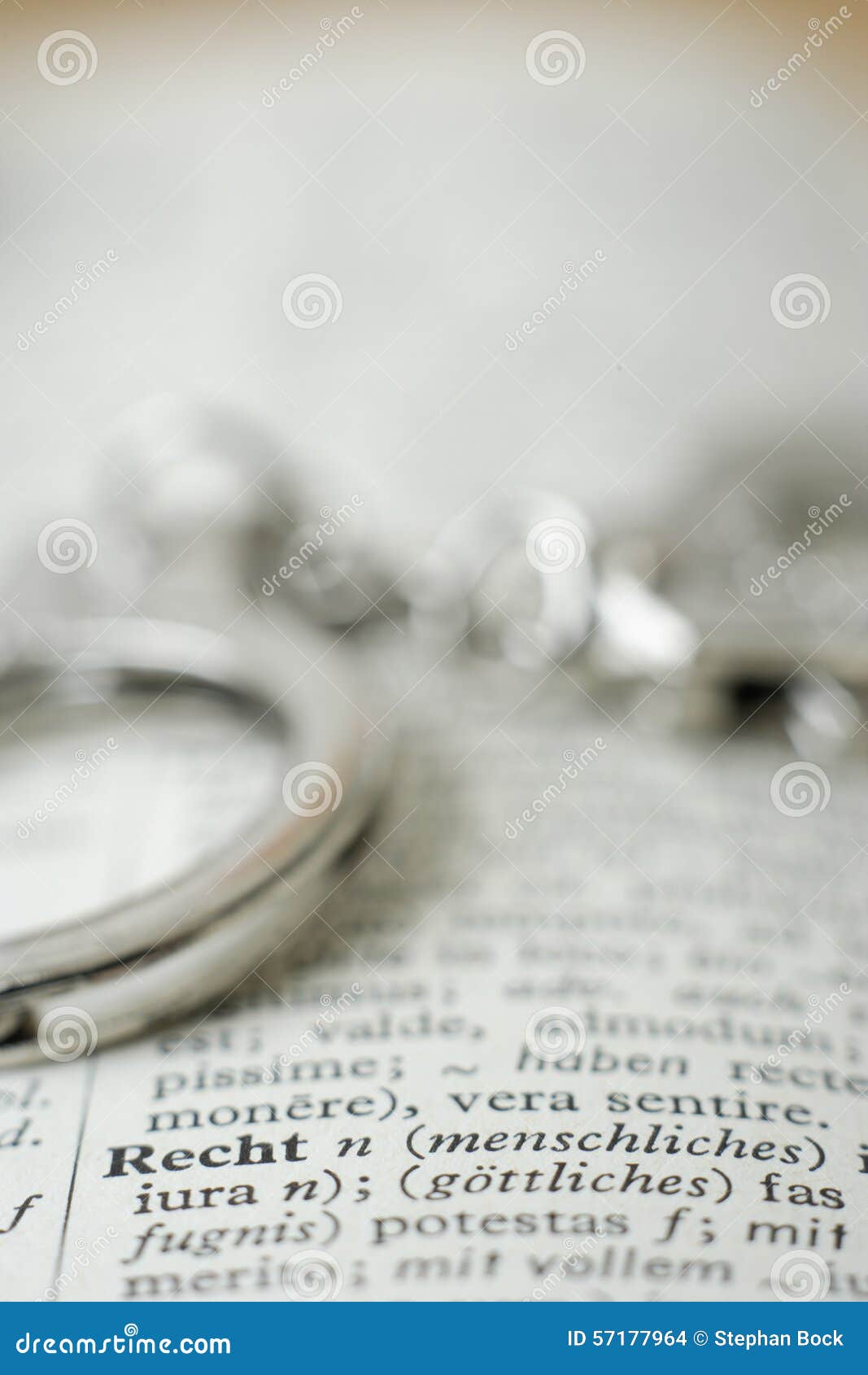 Close Up of Handcuffs on Dictionary Stock Photo Image of handcuff