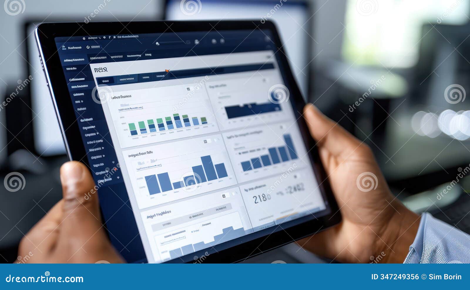 a close-up of hands holding a digital tablet