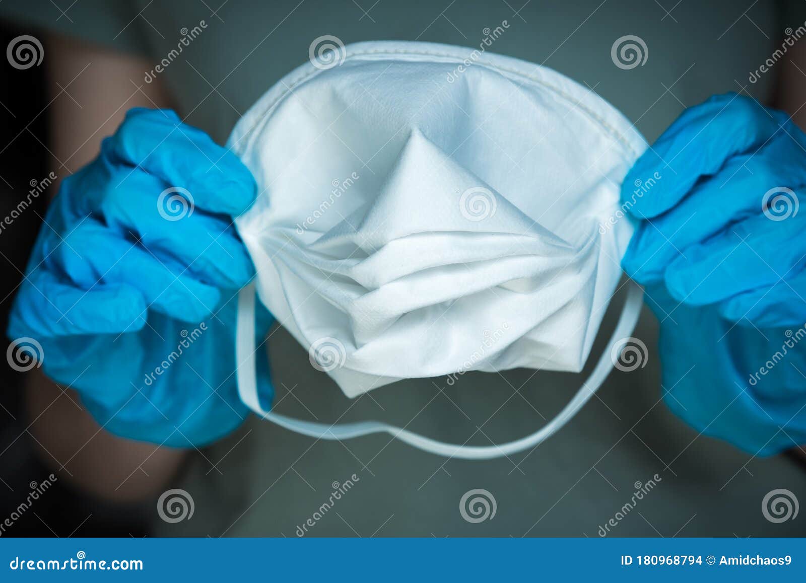 Closeup Of Hands Wearing Surgical Gloves And Holdin