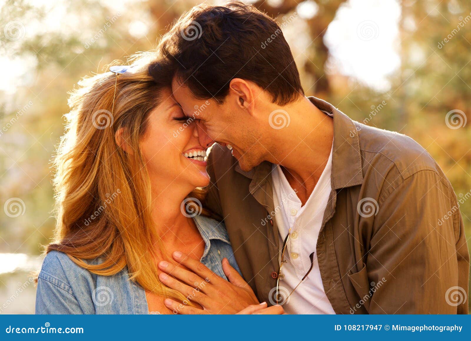 Close Up Happy Couple Standing Together Laughing In Close Embrace Stock Image Image Of Beauty