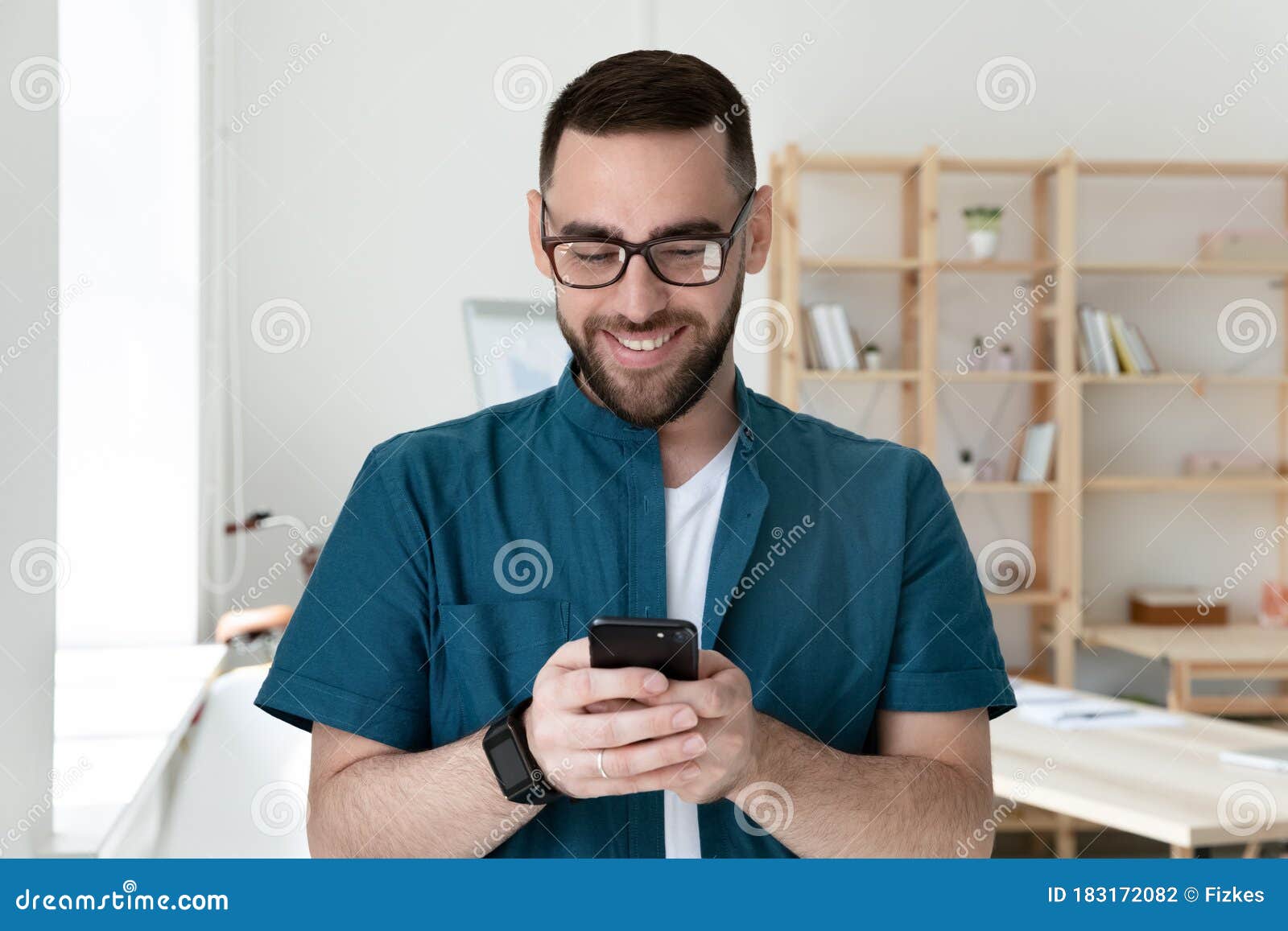 Close Up Happy Handsome Young Businessman Using Smartphone