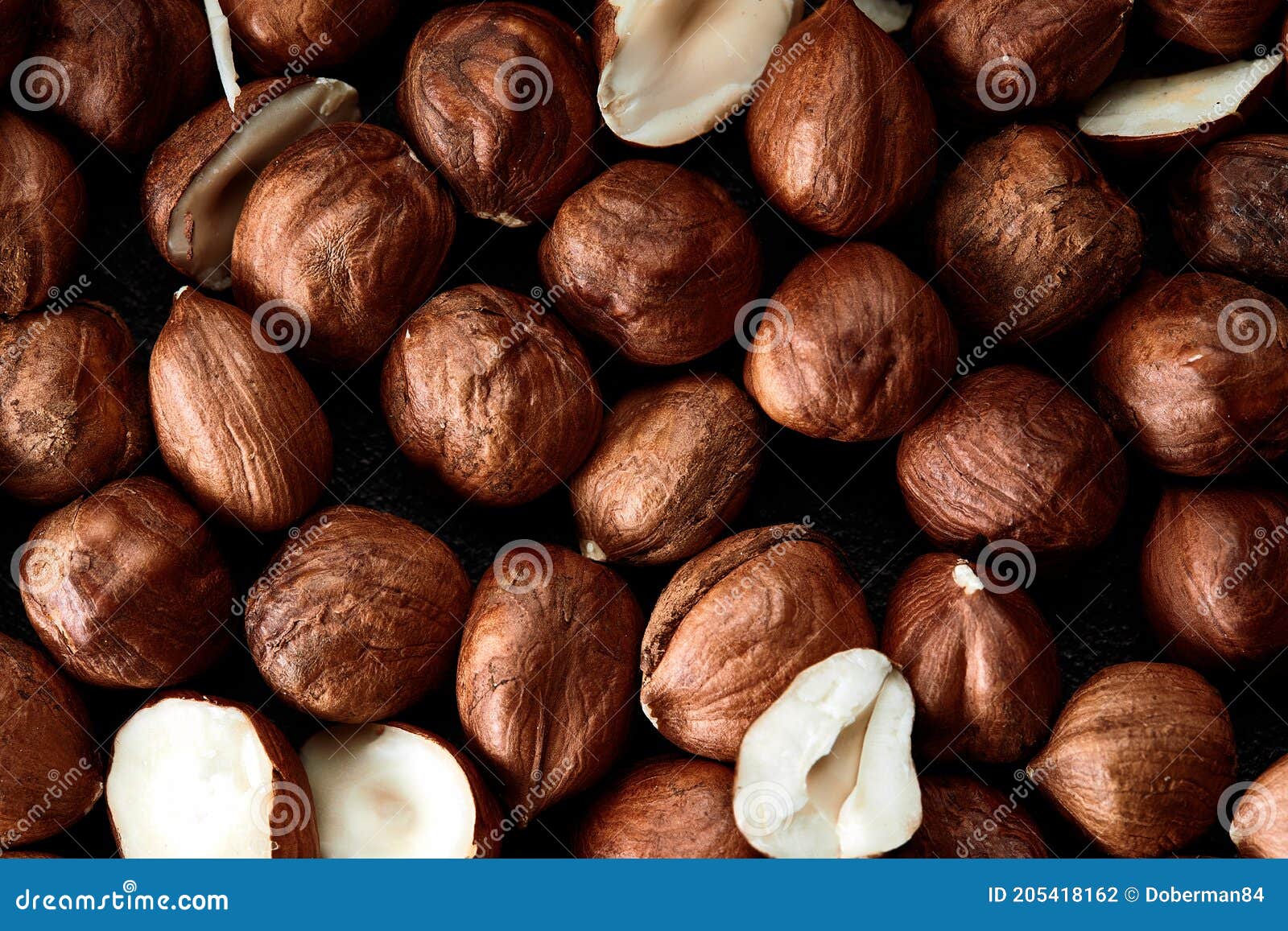 close up of hazelnut kernels - food frame background, macro detailed close up.