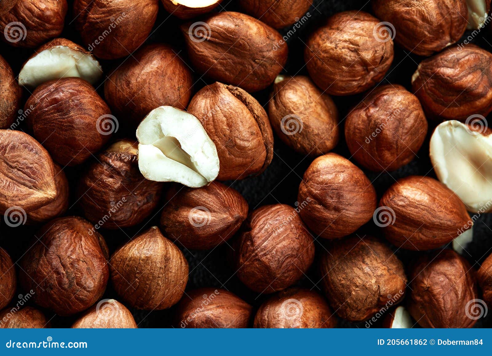 close up of hazelnut kernels - food frame background, macro detailed close up.