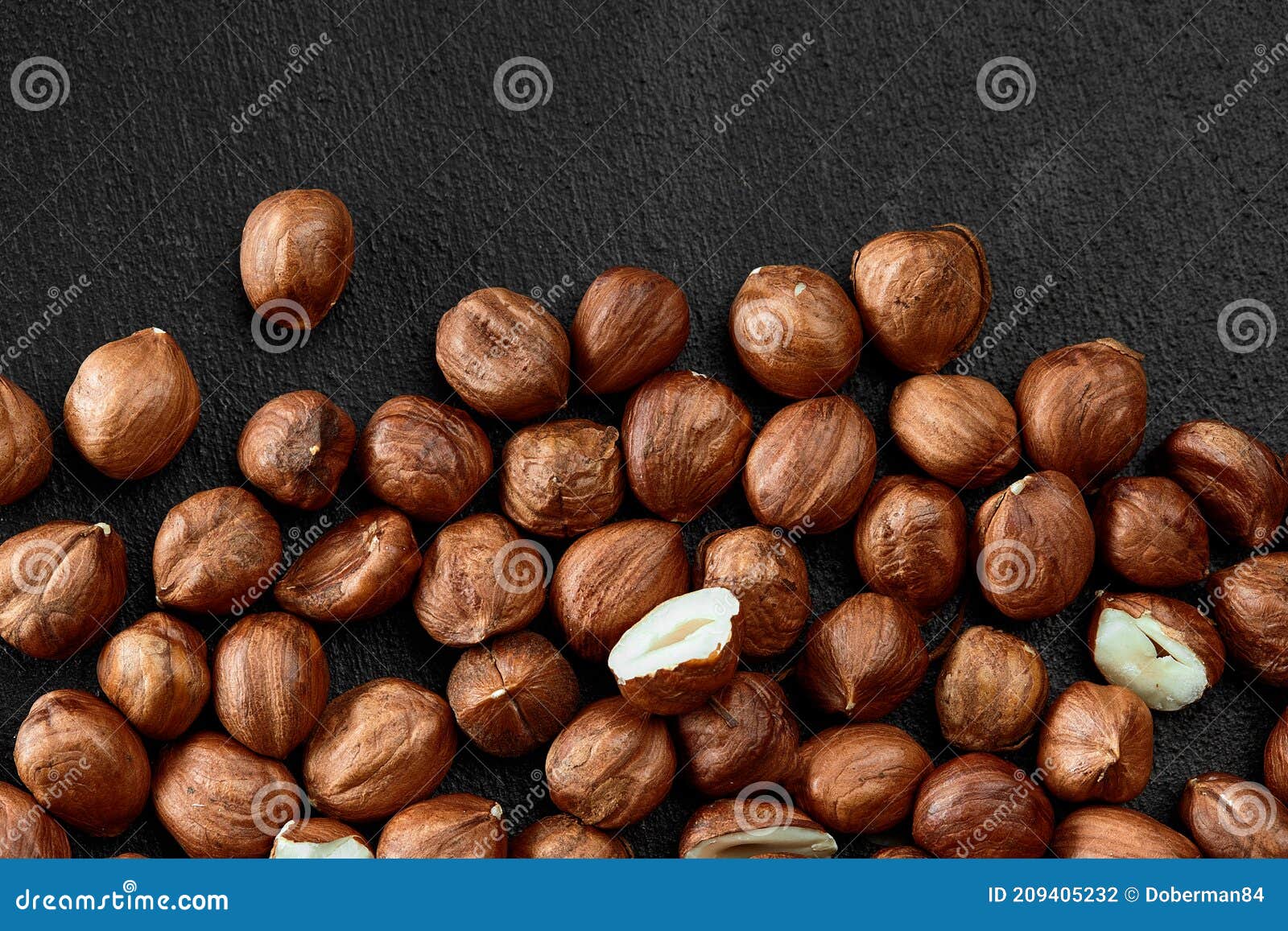 close up of hazelnut kernels - food frame background, macro detailed close up.