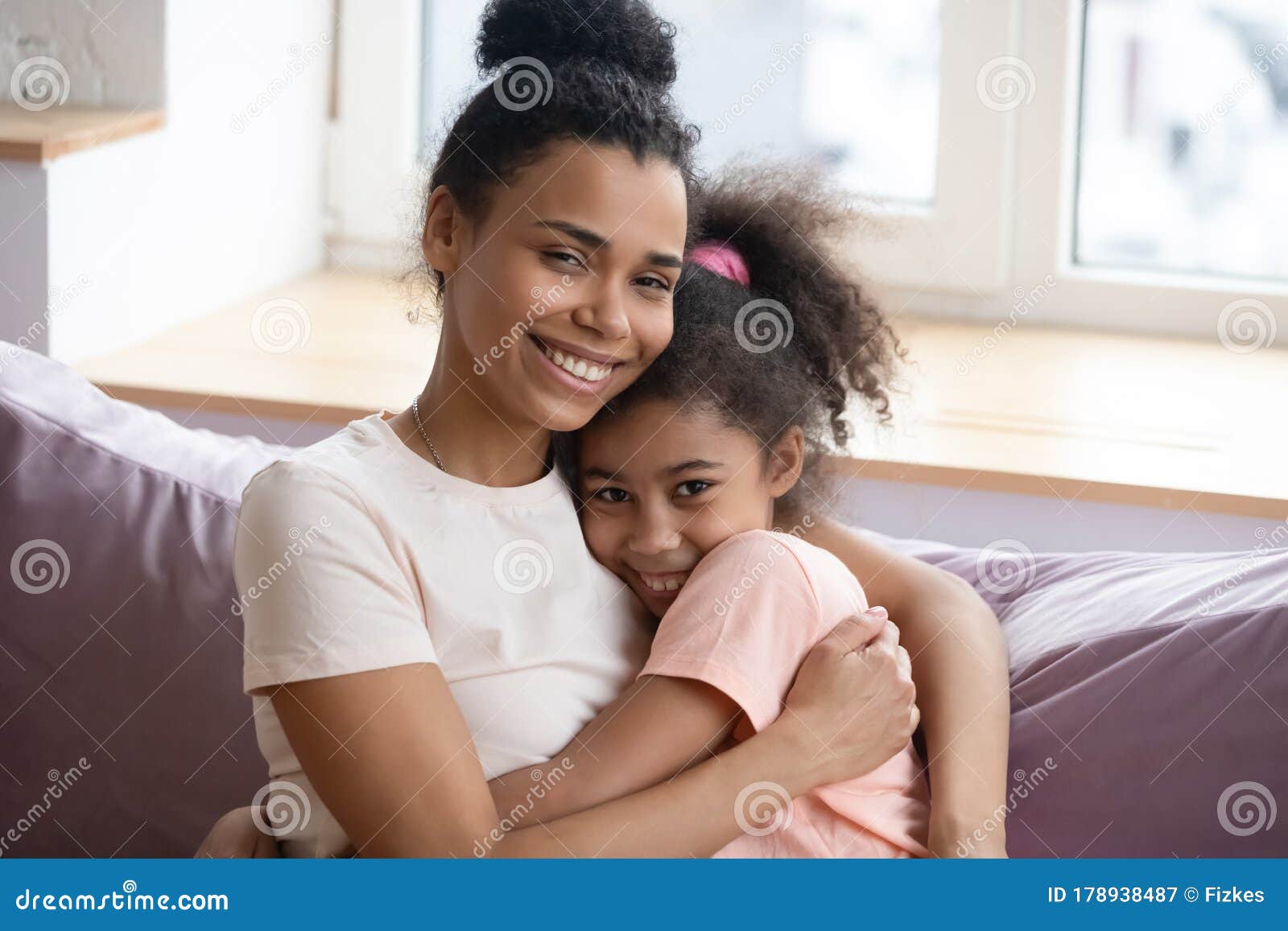 Close Up Headshot Portrait Of African American Mother And Daughter 