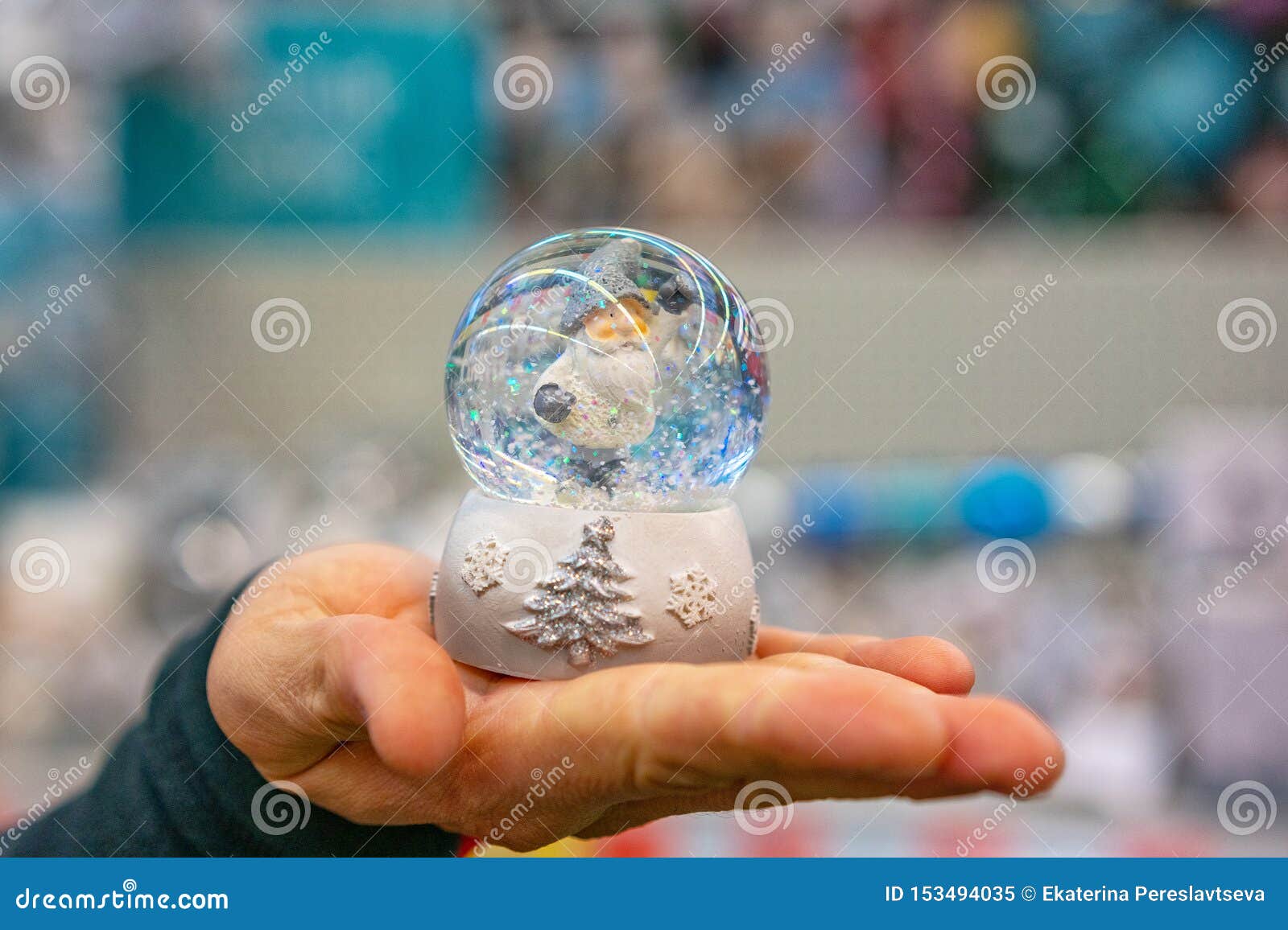 Close Up of a Holding a Snow Globe in Hand Stock Image Image of