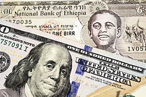 An Ethiopian One Birr Bank Note With A Blue American One Hundred Dollar 
