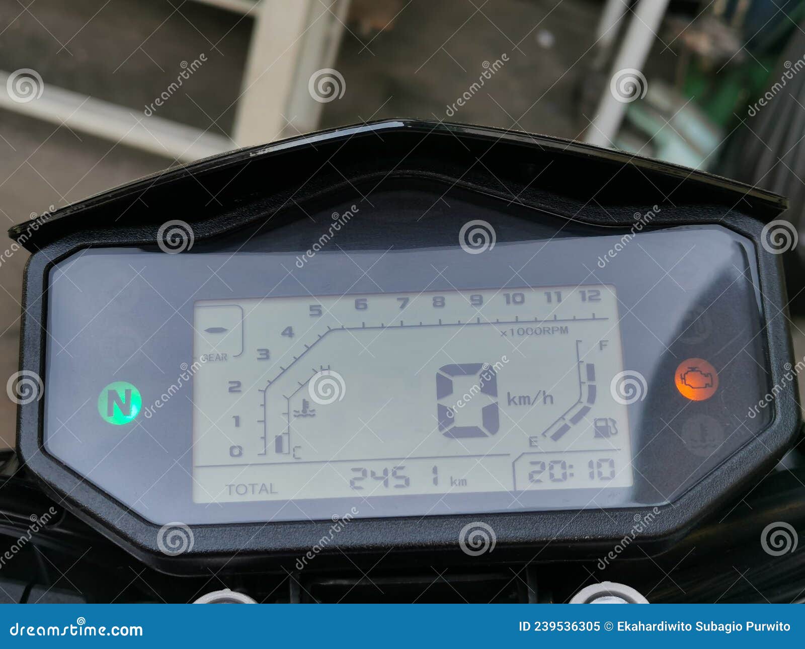 close up image of motorcycle digital speedo meter.