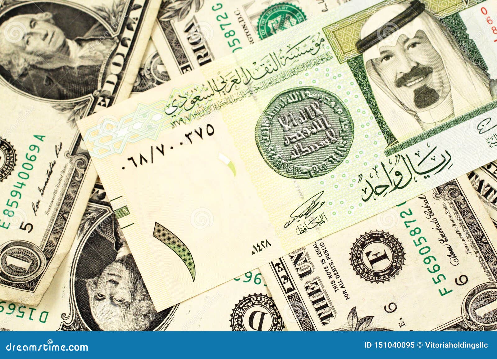 A Saudi Arabian One Riyal Bank Note On A Bed Of American One Dollar Bills Stock Image Image Of East Gold A Saudi Arabian One Riyal Bank Note On A Bed Of American One Dollar Bills Stock Image Image Of East Gold