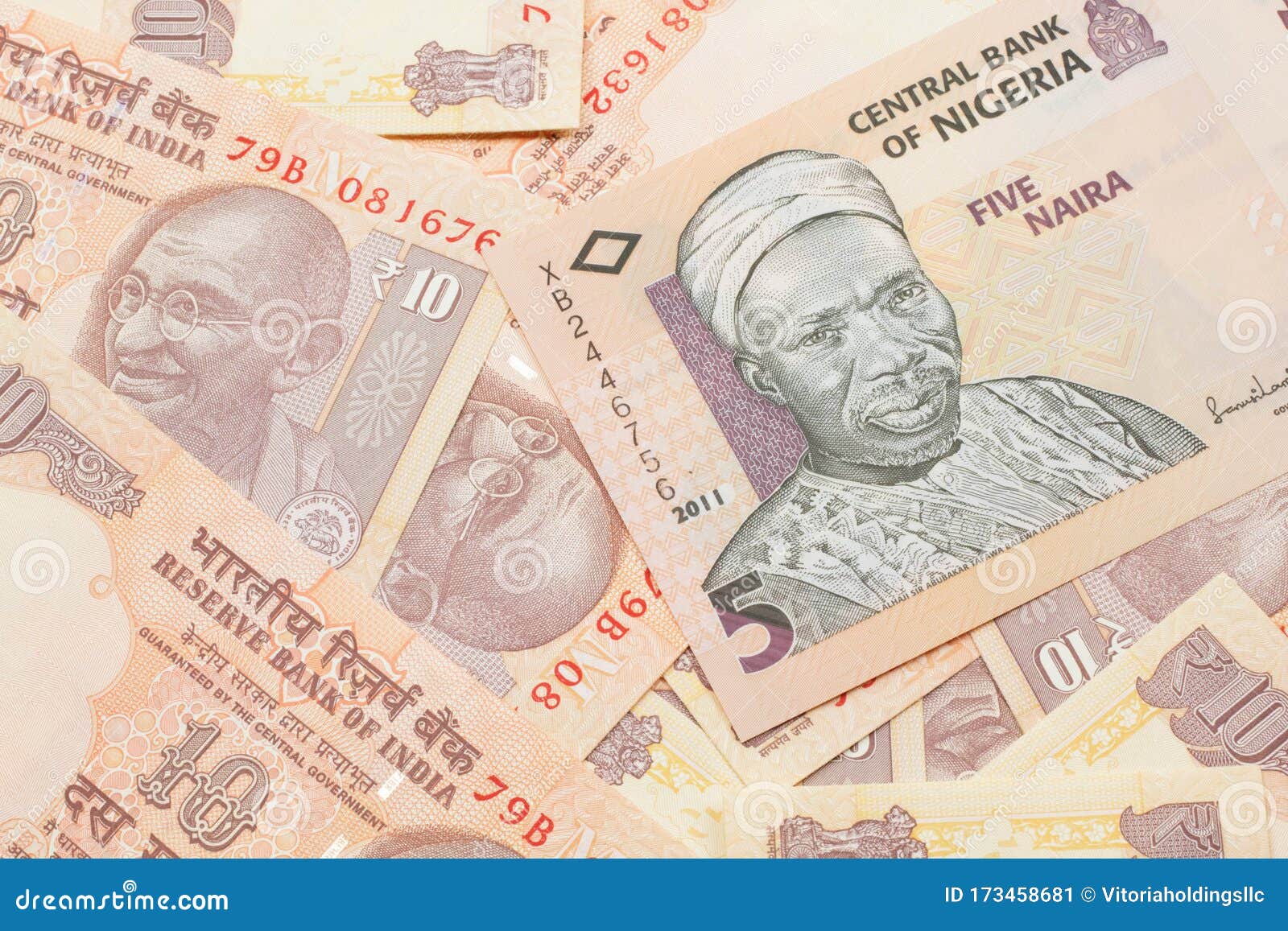 A Nigerian Five Naira Bank Note With Indian Ten Rupee Bank Notes Stock