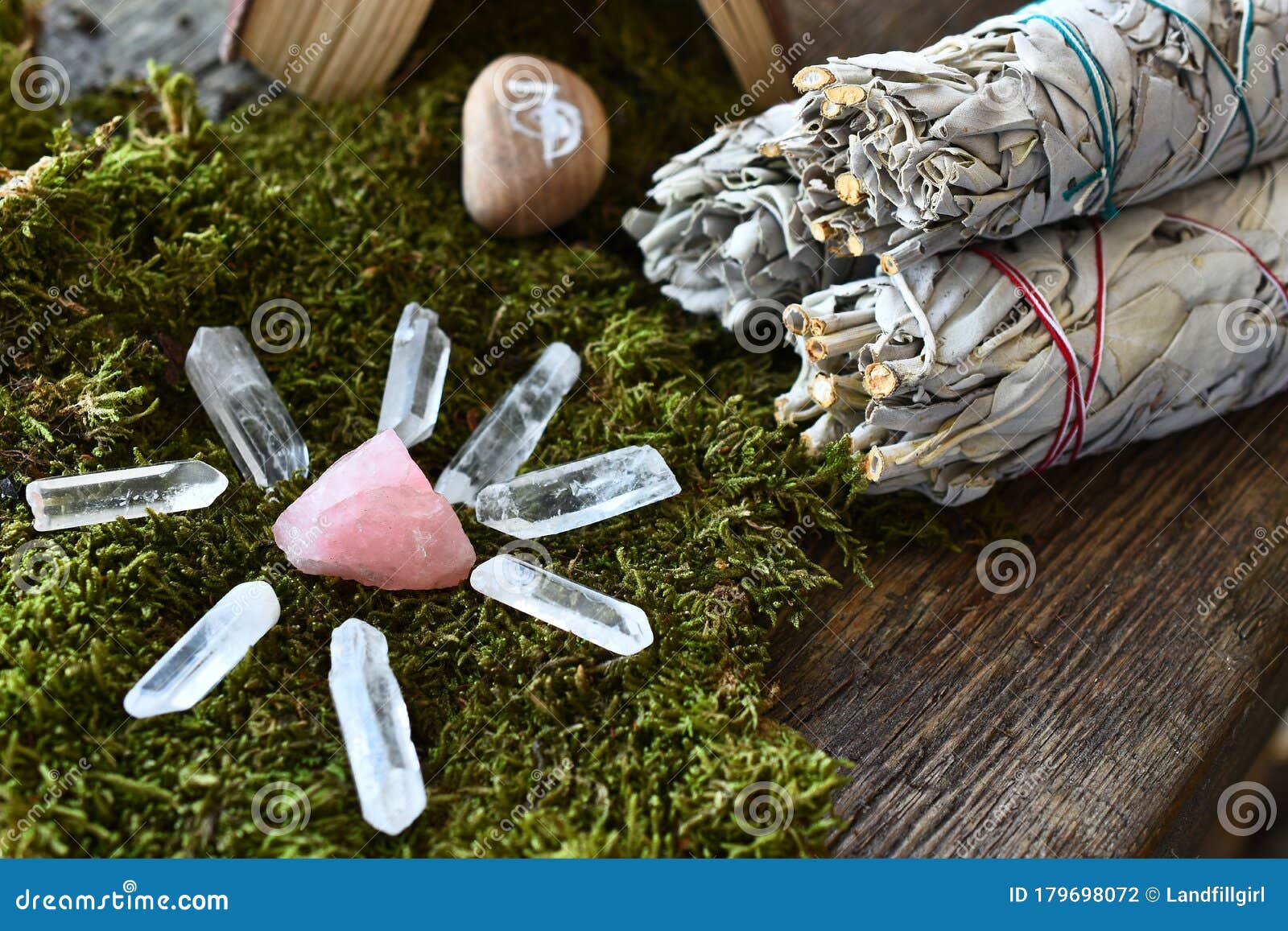 rose quartz crystals and white sage smudge sticks