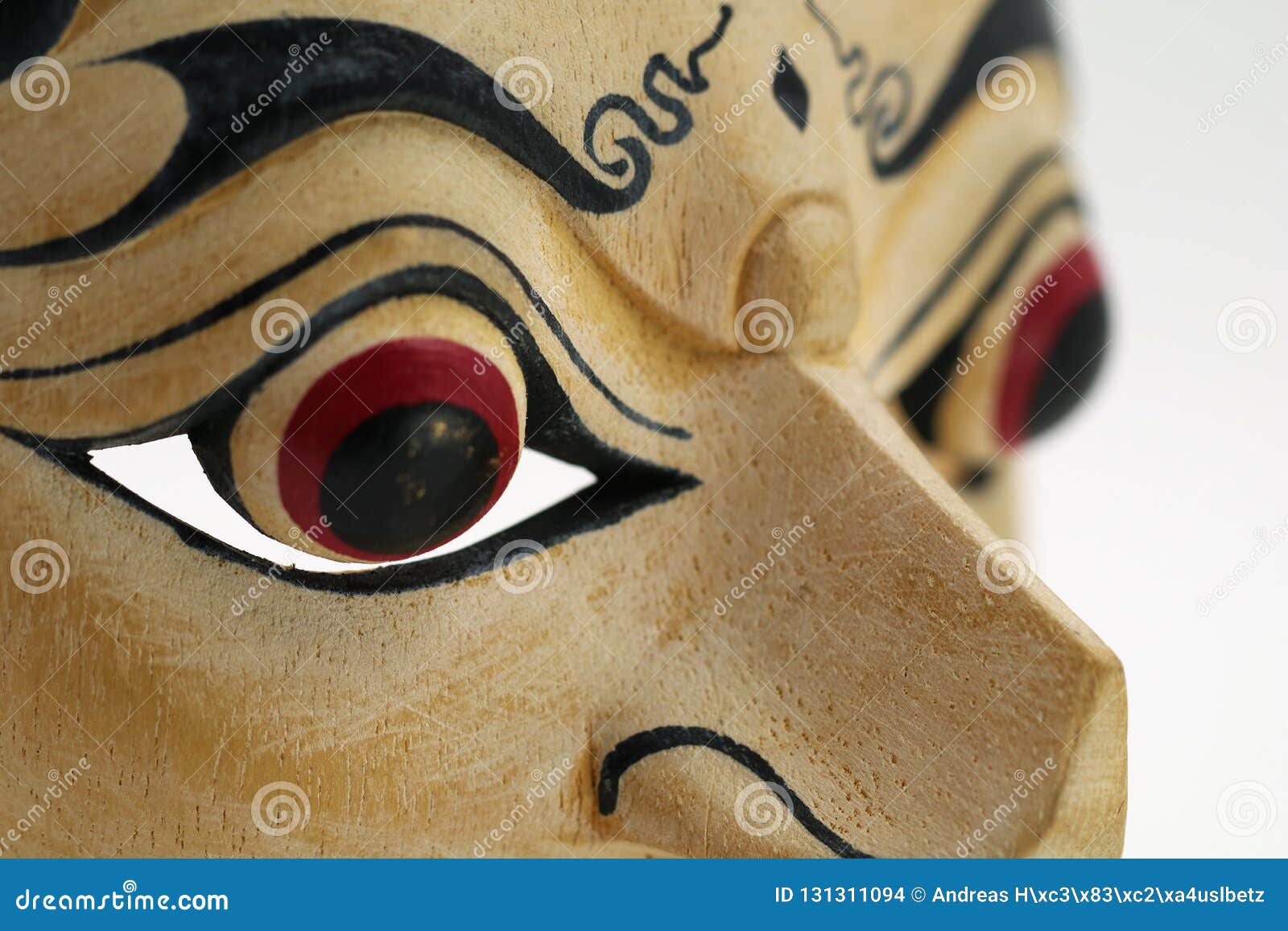 close up of indonesian mask, topeng, maschera on white background