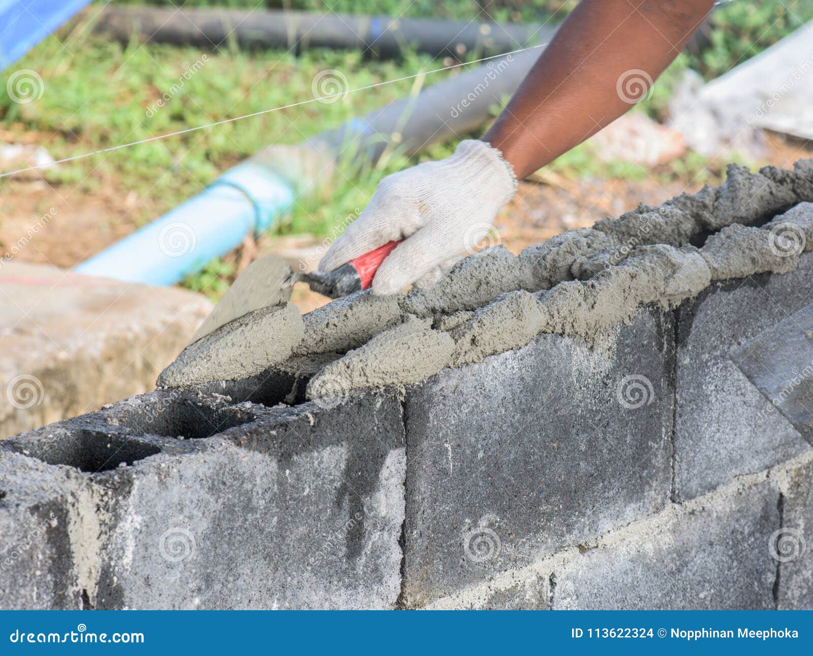 How To Lay Bricks Bricklayer Laying Bricks With Hammer. Masonry